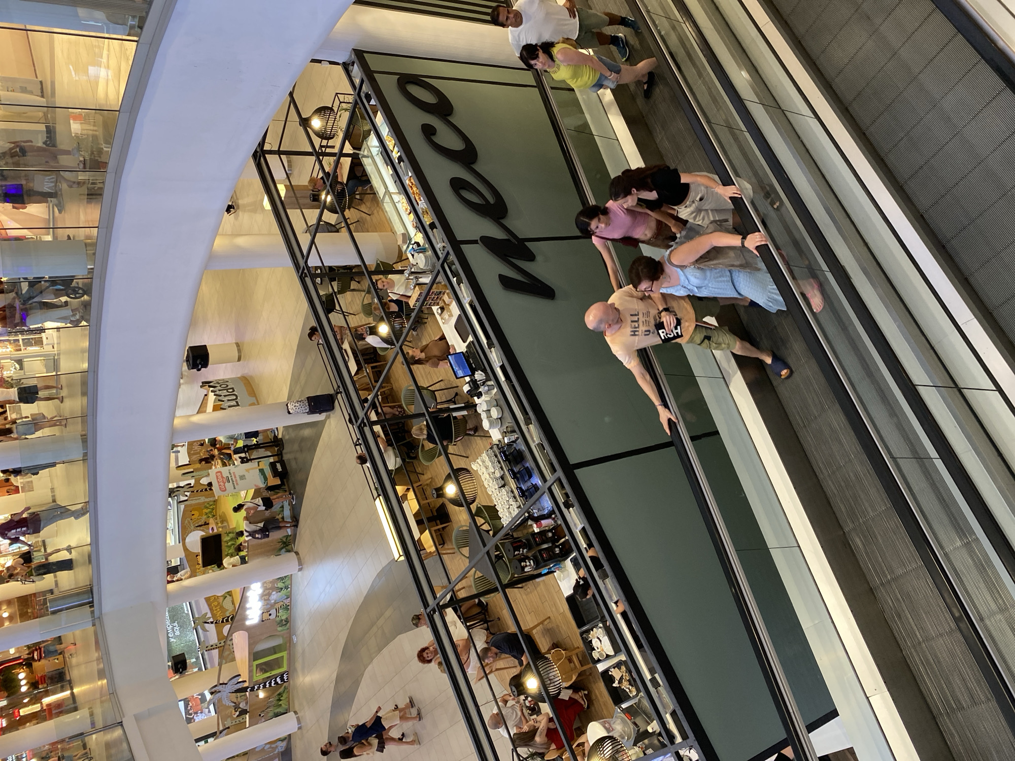 Browsing a busy Valencia mall on a Sunday afternoon