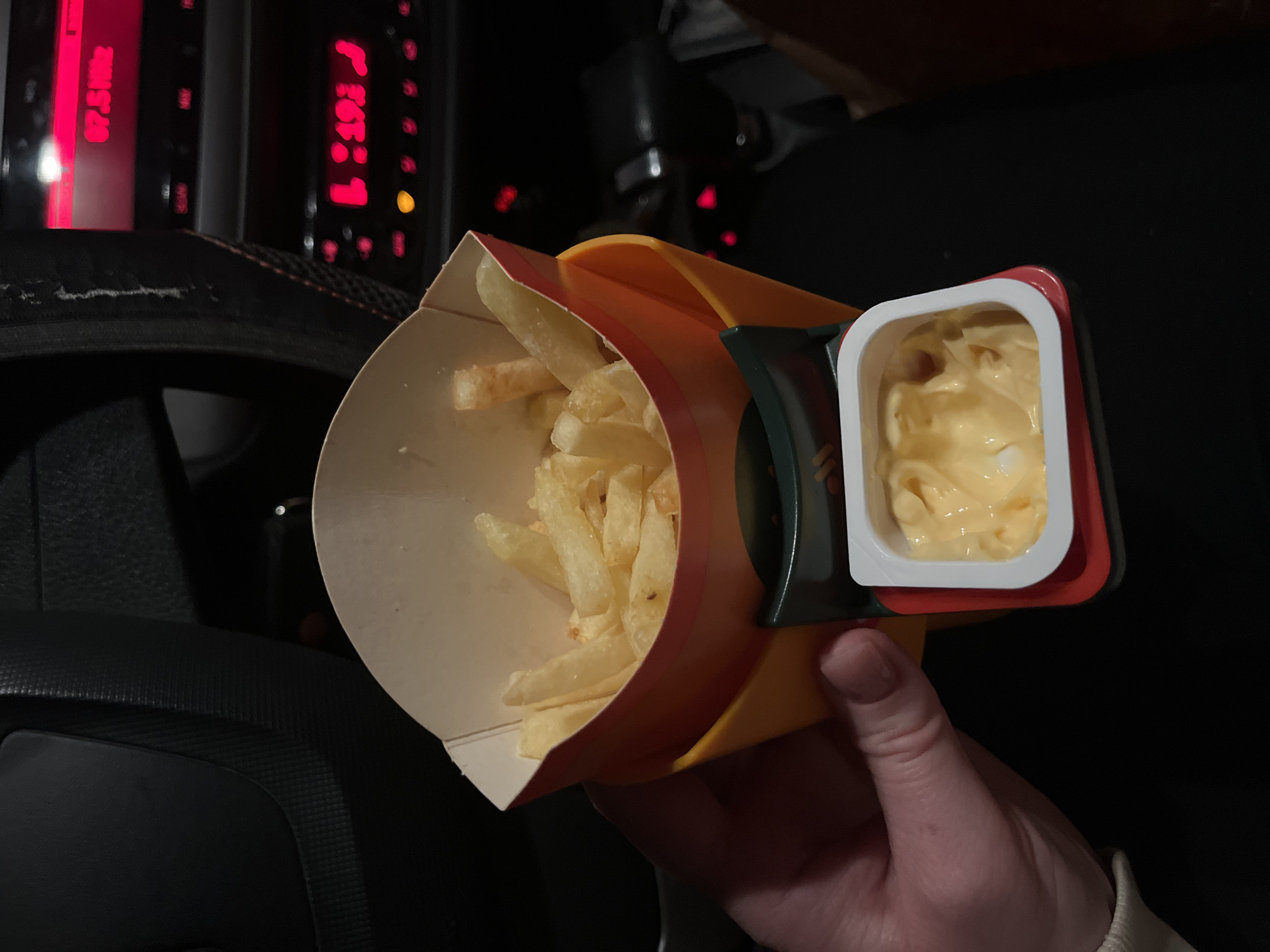 Fast food consumed in car interior, Klin Russia