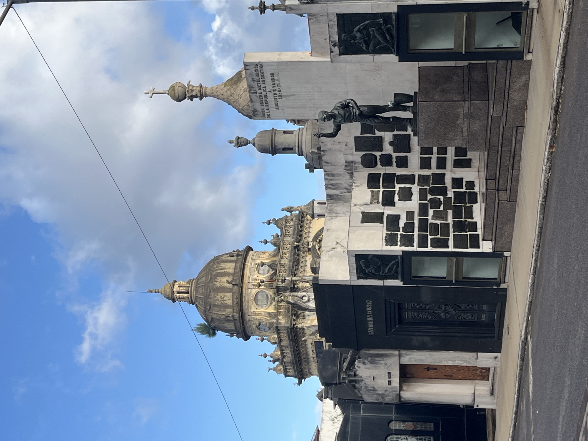 Tourist documents evening walk through historic Buenos Aires landmarks