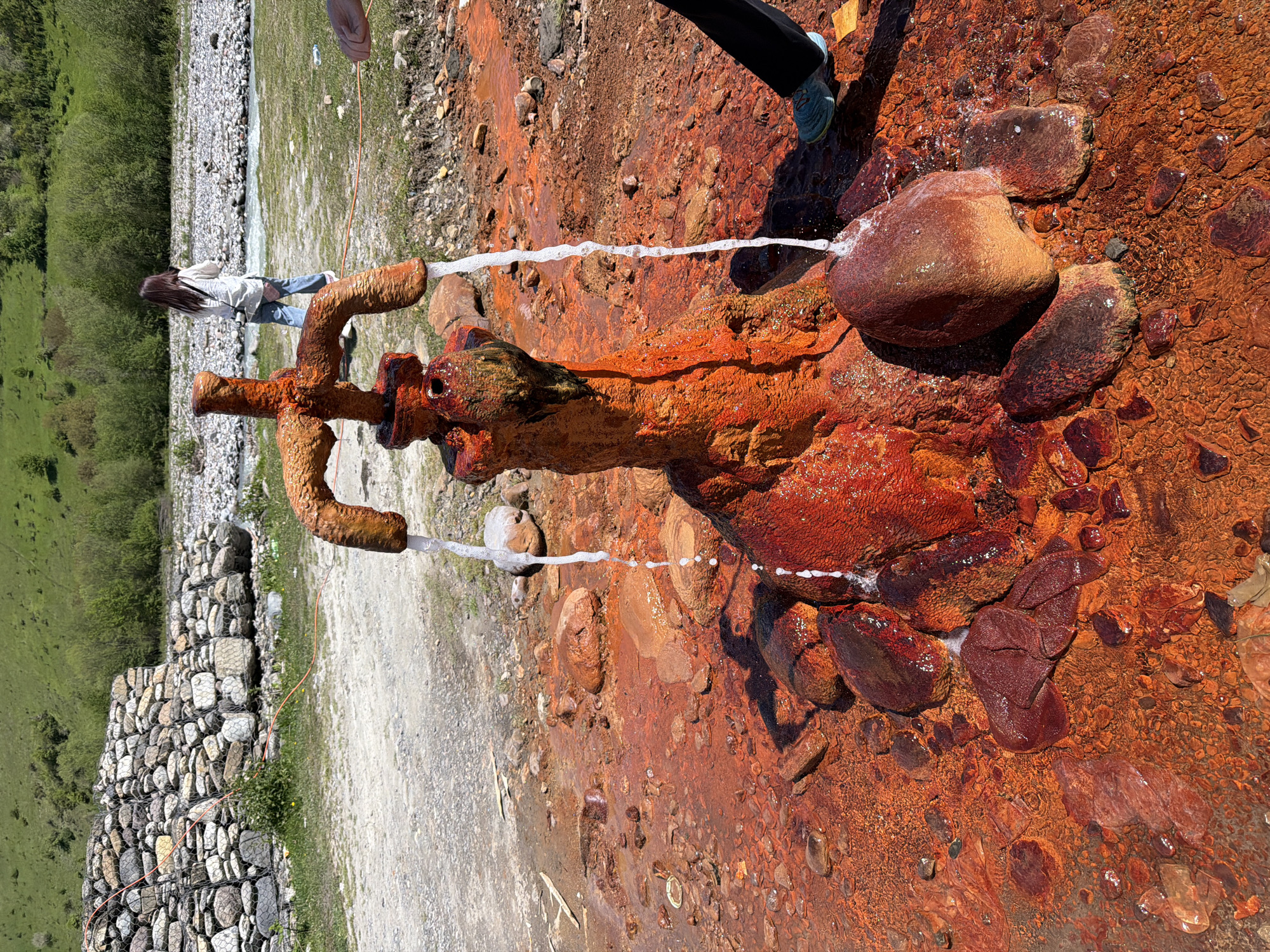 Iron-rich mineral spring flows in Naghvarevi, Georgia