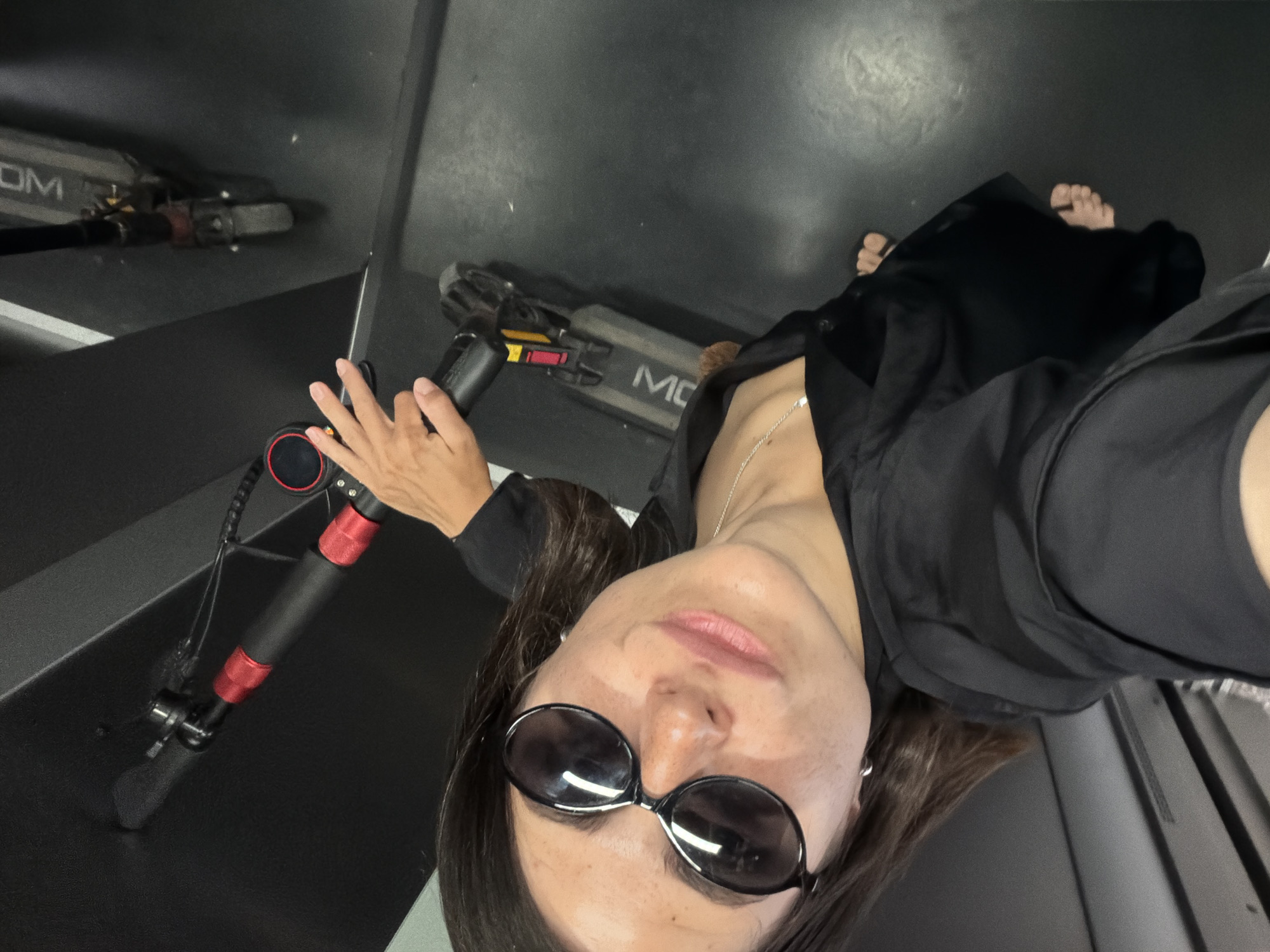 Woman with electric scooter documented around Budva, Montenegro morning
