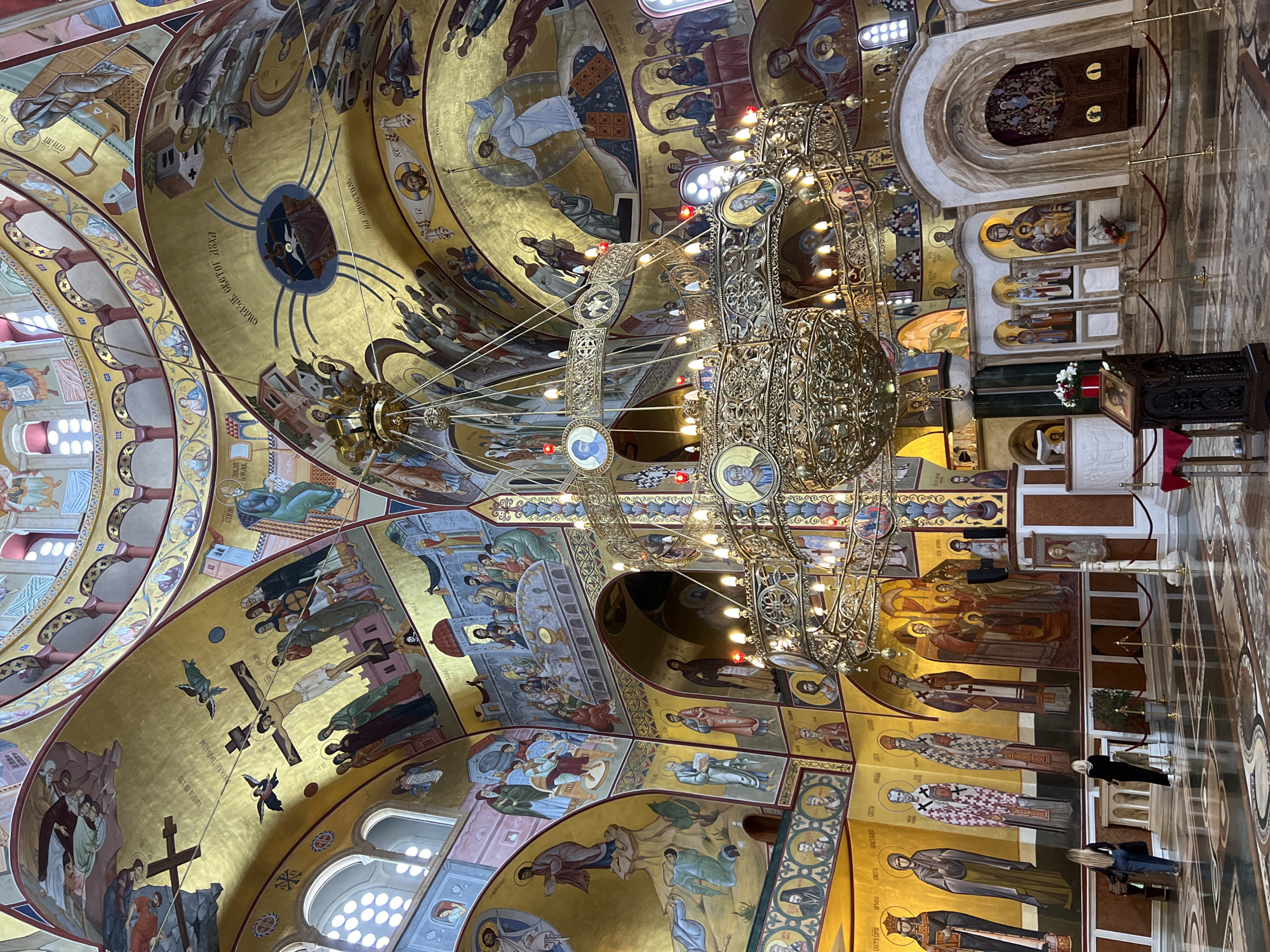 Church interior with golden religious artwork documented in Podgorica