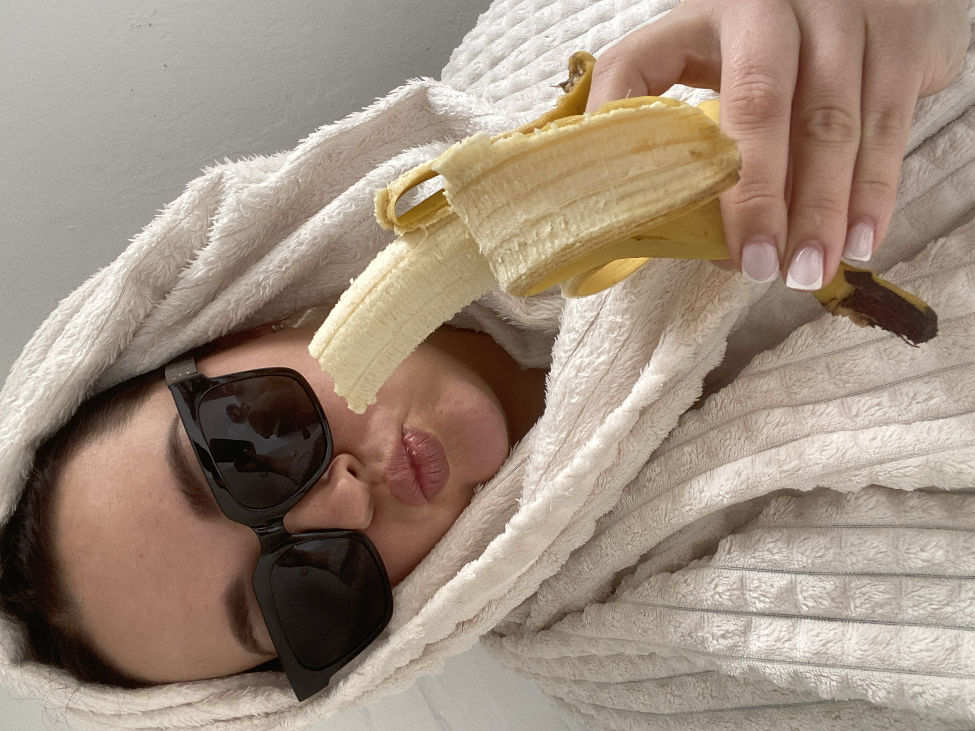 Woman poses with banana in Sochi social media moment