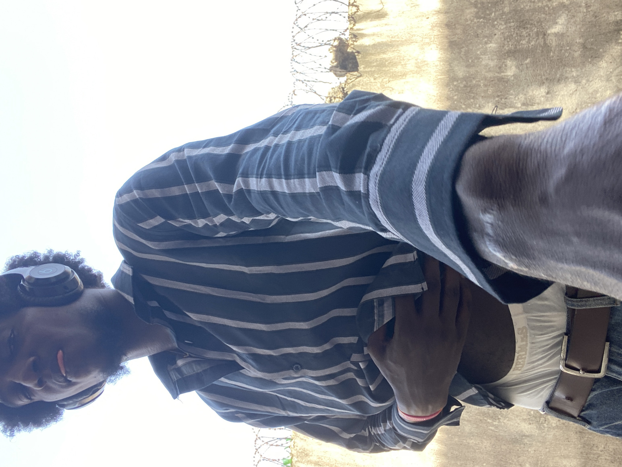 Man's casual moments captured across Lagos locations