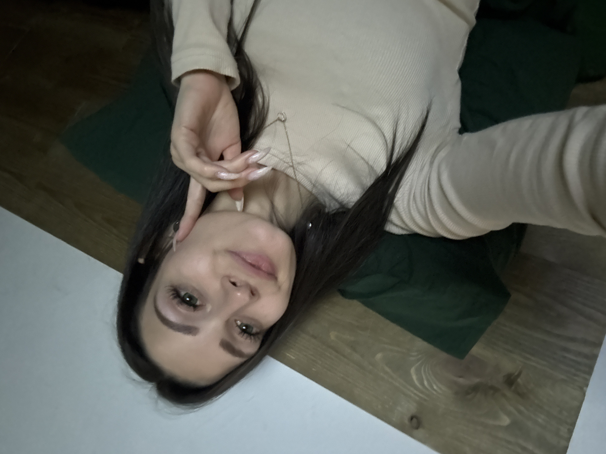 Woman takes selfie indoors in Reutov, Russia
