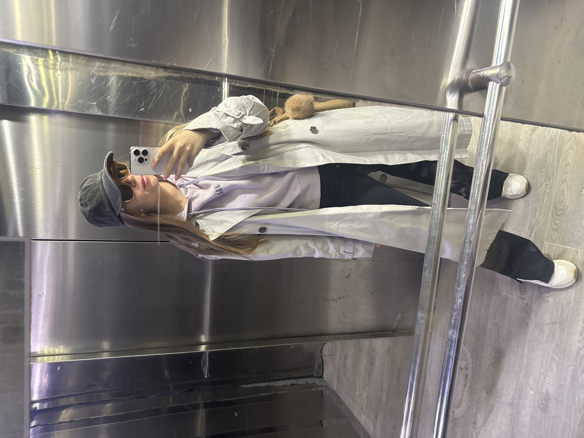 Woman Takes Selfie in Elevator, Batumi Georgia
