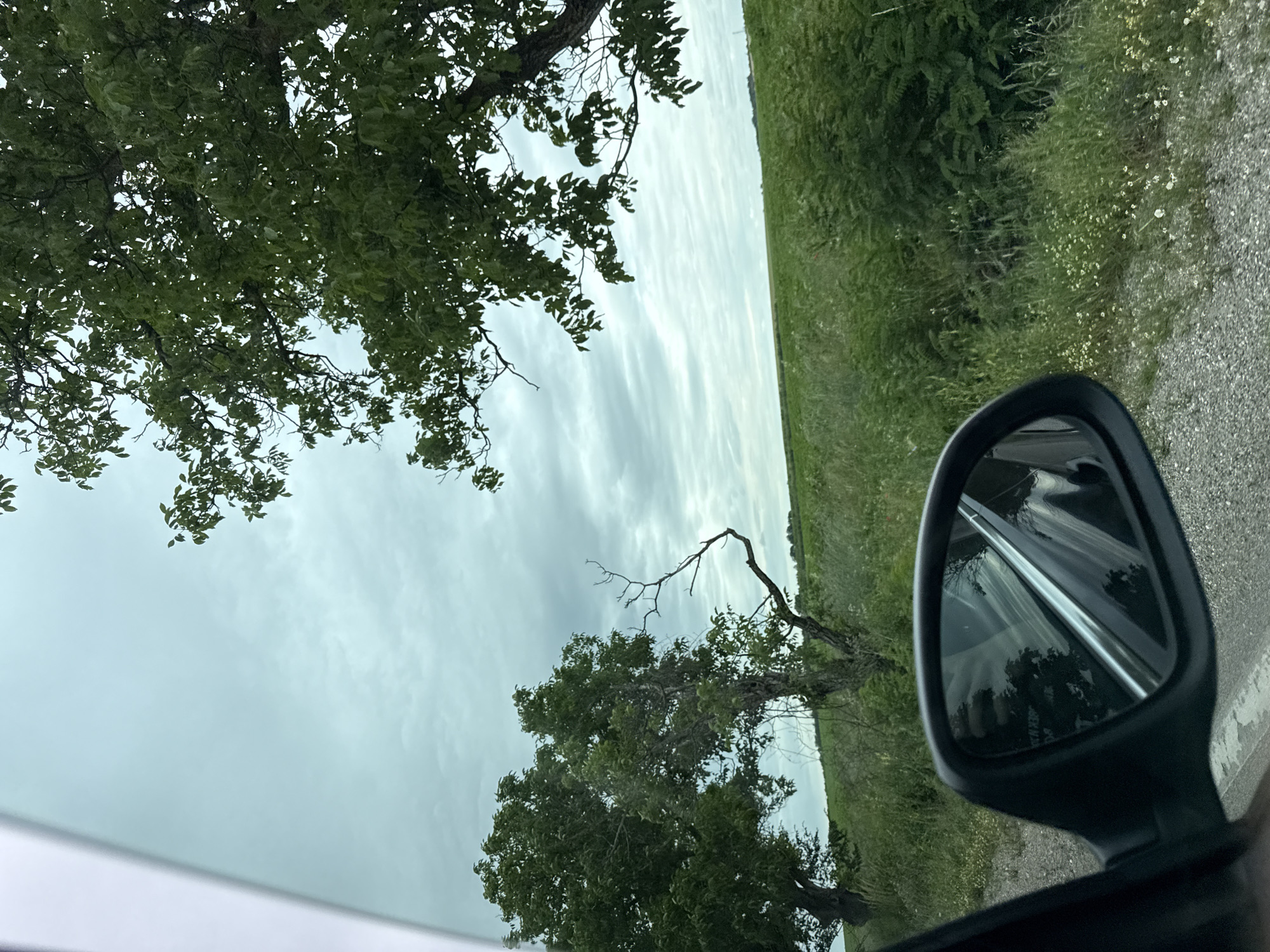Driver travels gravel road through green countryside near Lovech
