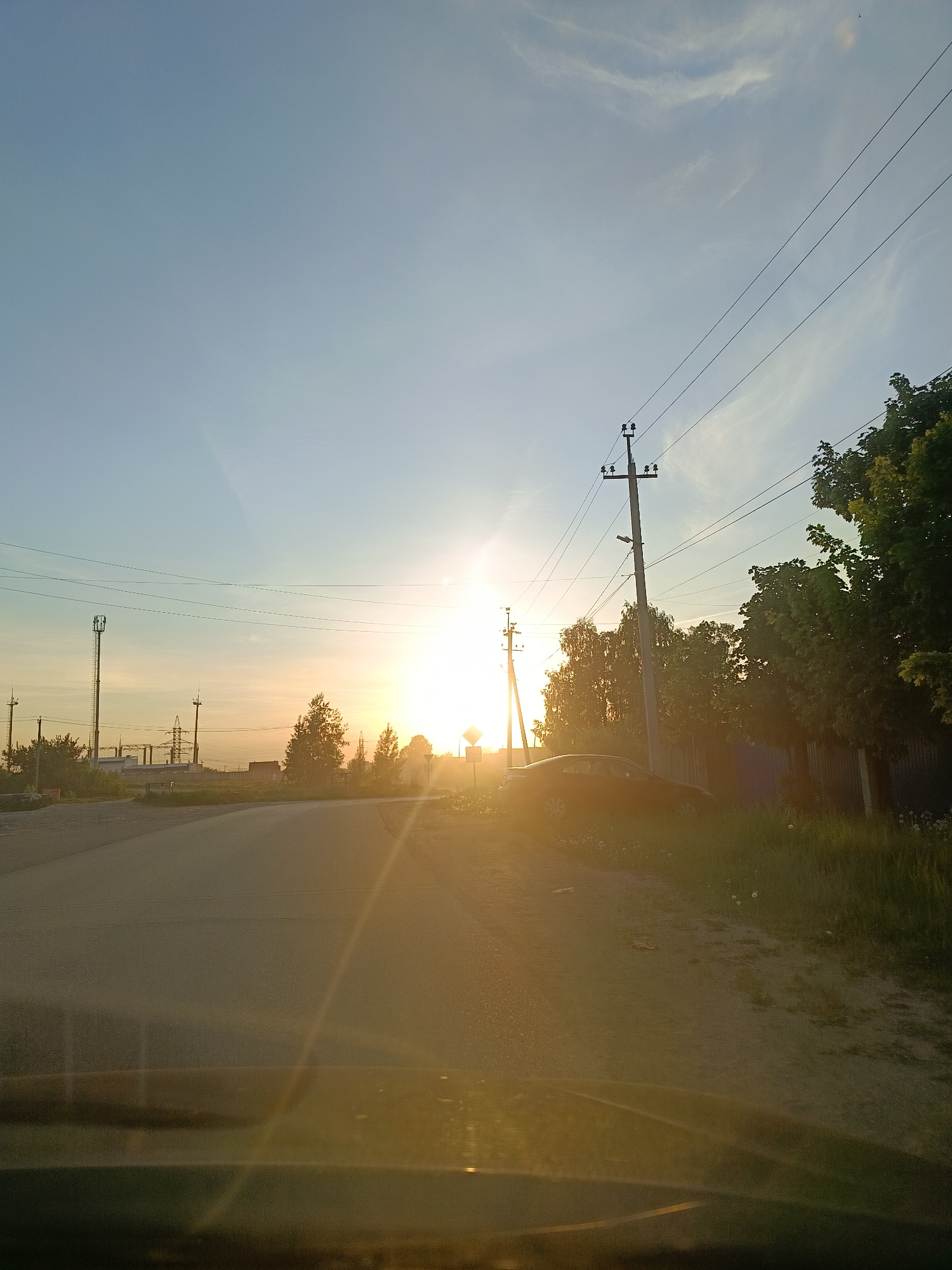 Woman documents sunset drive through Chaikovsky, Russia