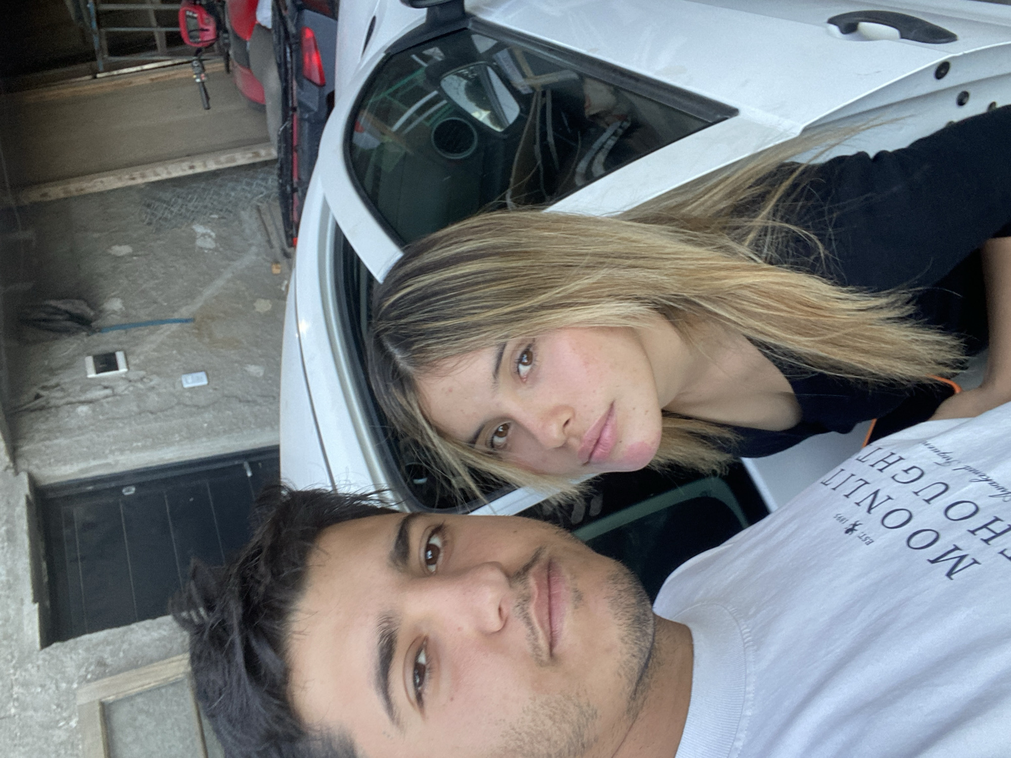 Couple takes evening selfies with dog in Sumalao, Argentina