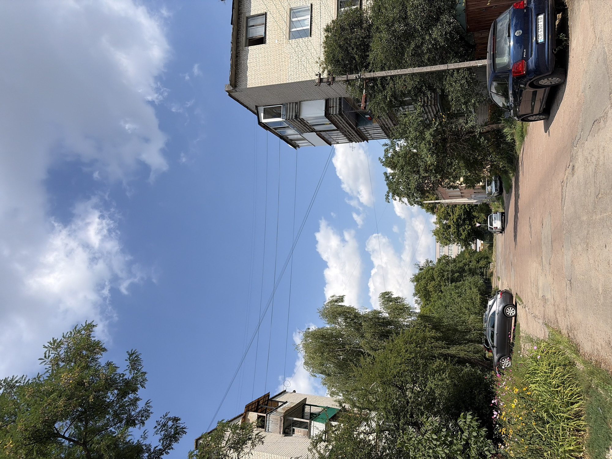 Selfies and street scenes on a summer walk through an Eastern European neighborhood
