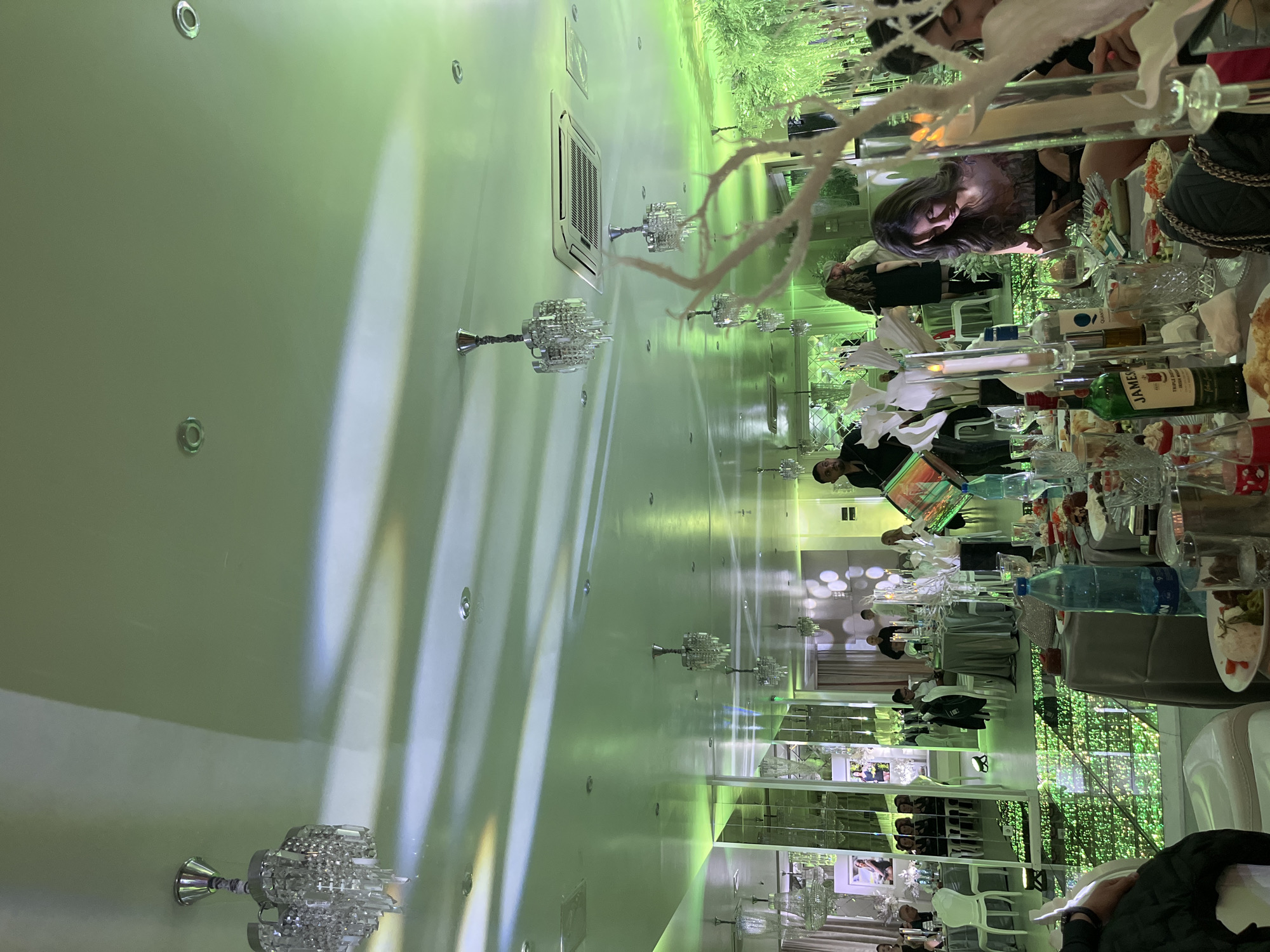 Formal event with indoor dining, outdoor space documented in Bulgaria