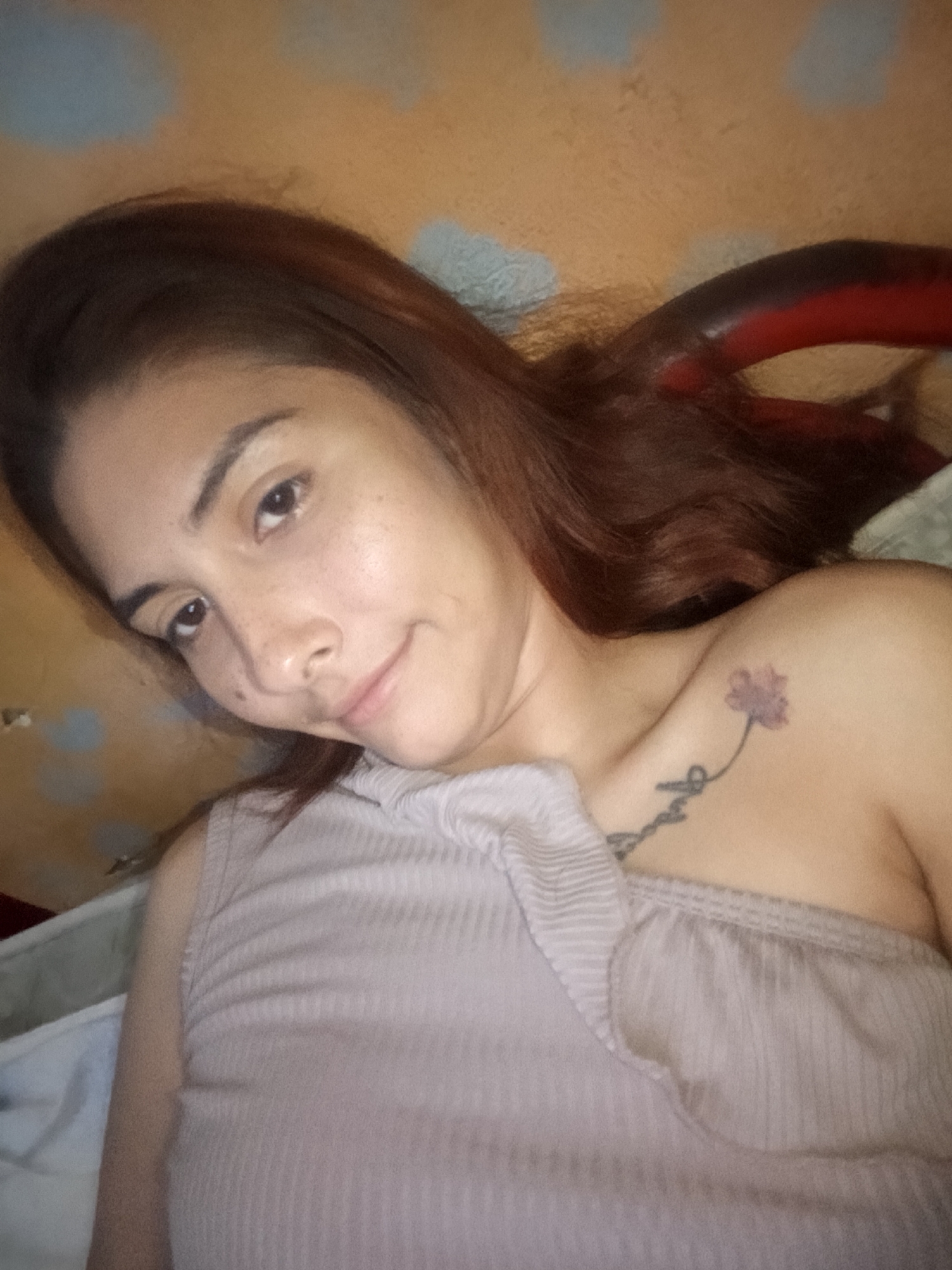 Woman photographed in bedroom in Juan Griego, Venezuela