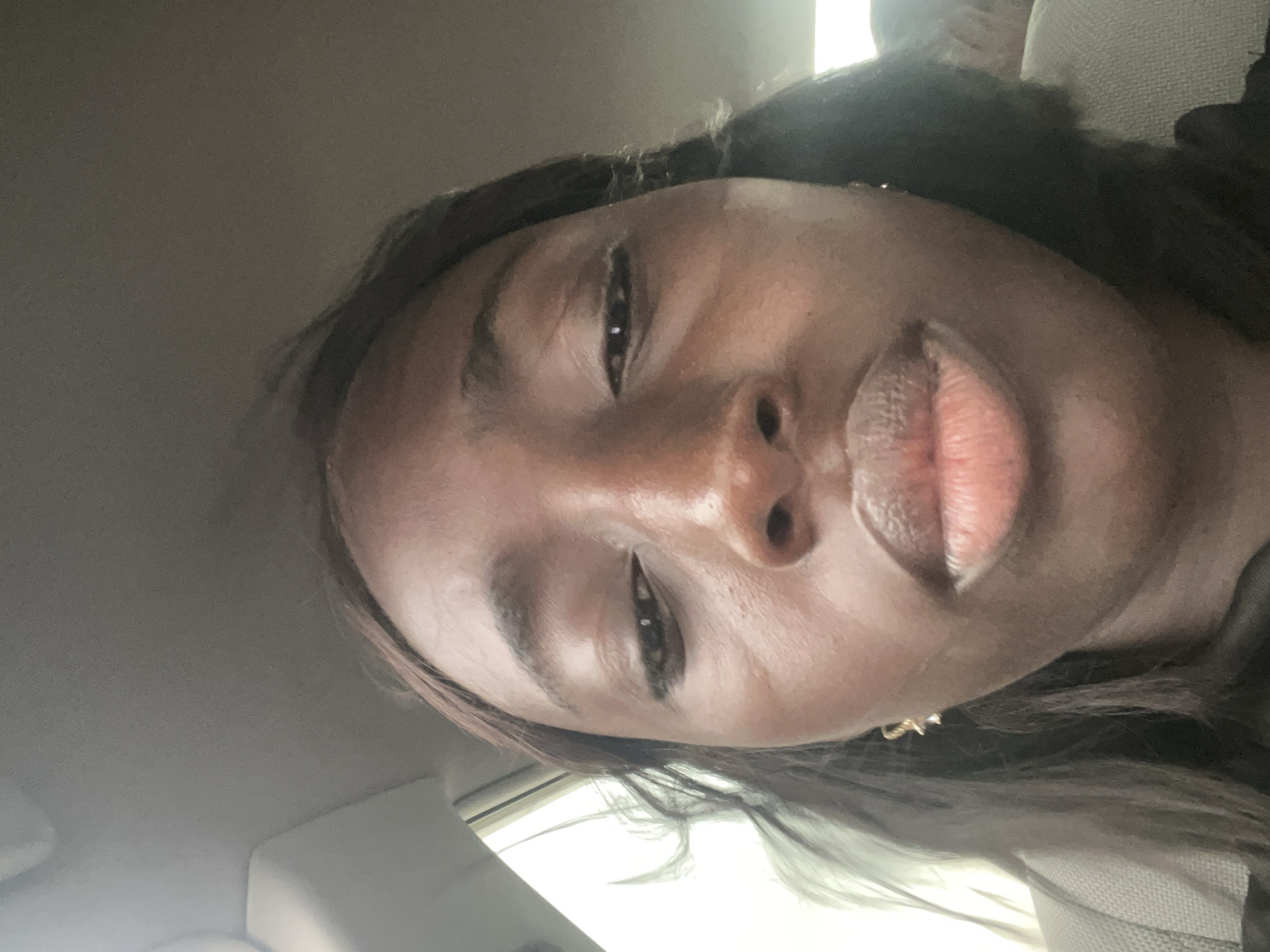 Woman photographed in vehicle in Karum, Nigeria