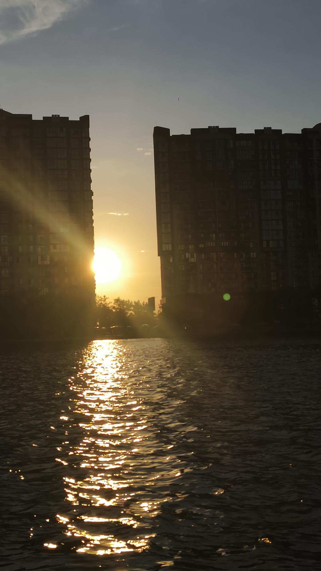Astrakhan sunset silhouettes high-rises over the Volga