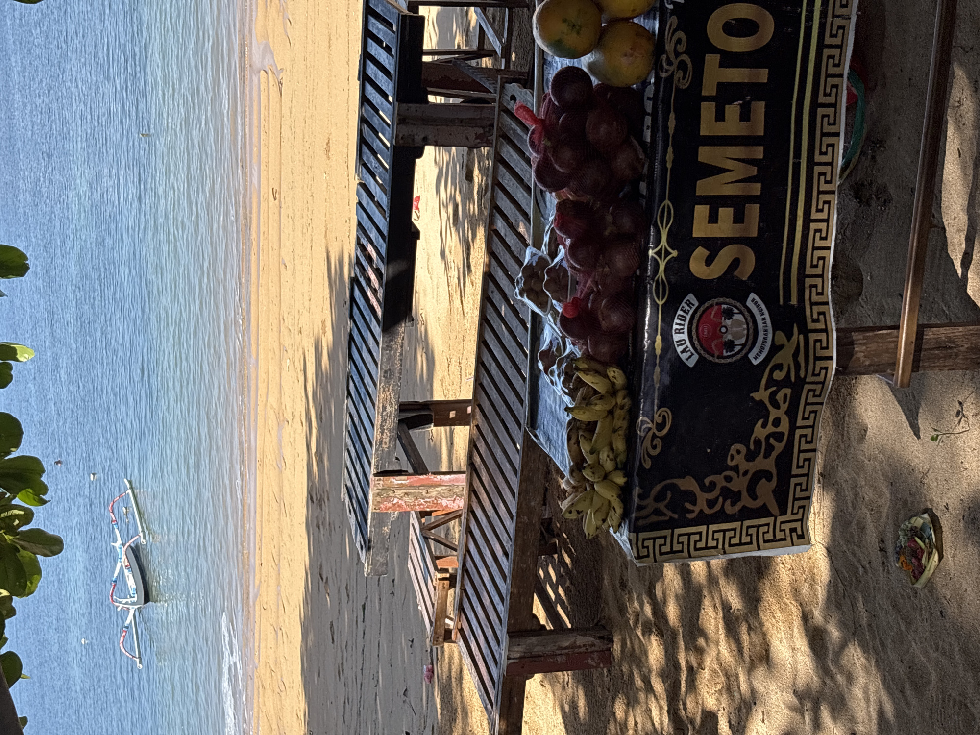 Morning scenes captured in Denpasar: cycling families, fruit vendors