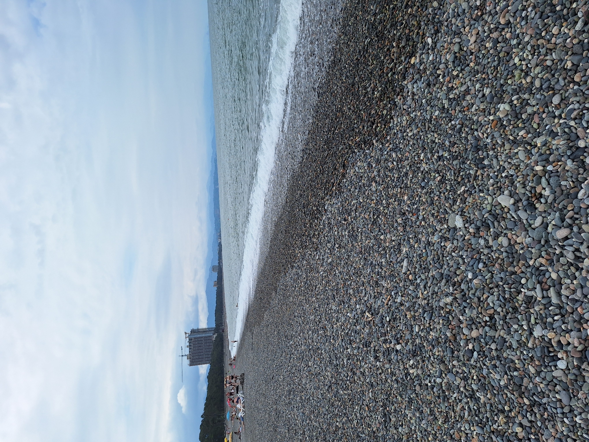 Cloudy morning on the pebble beach in Kobuleti, Georgia