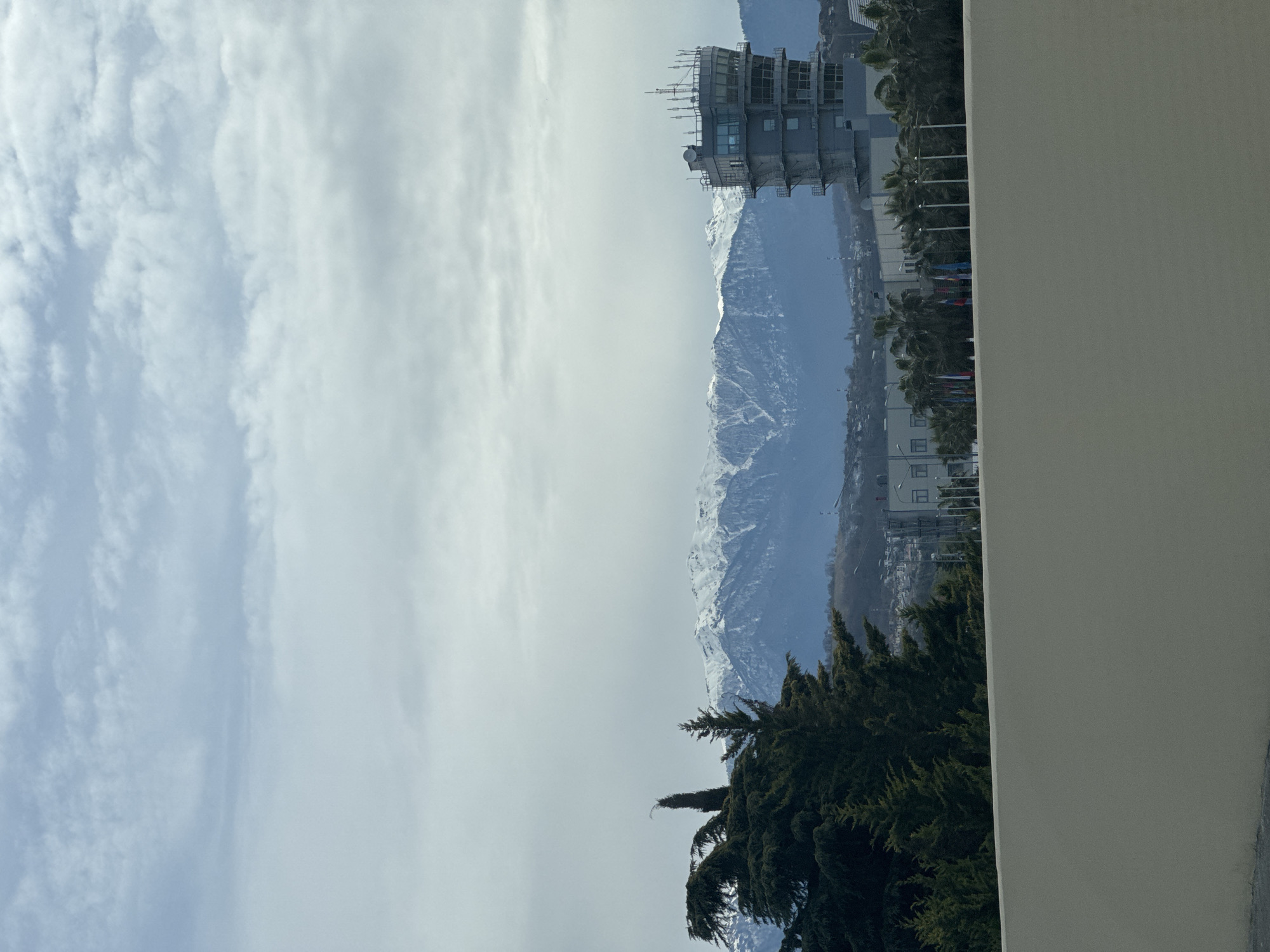 Mixed landscape view captured in Sochi showing mountains and buildings