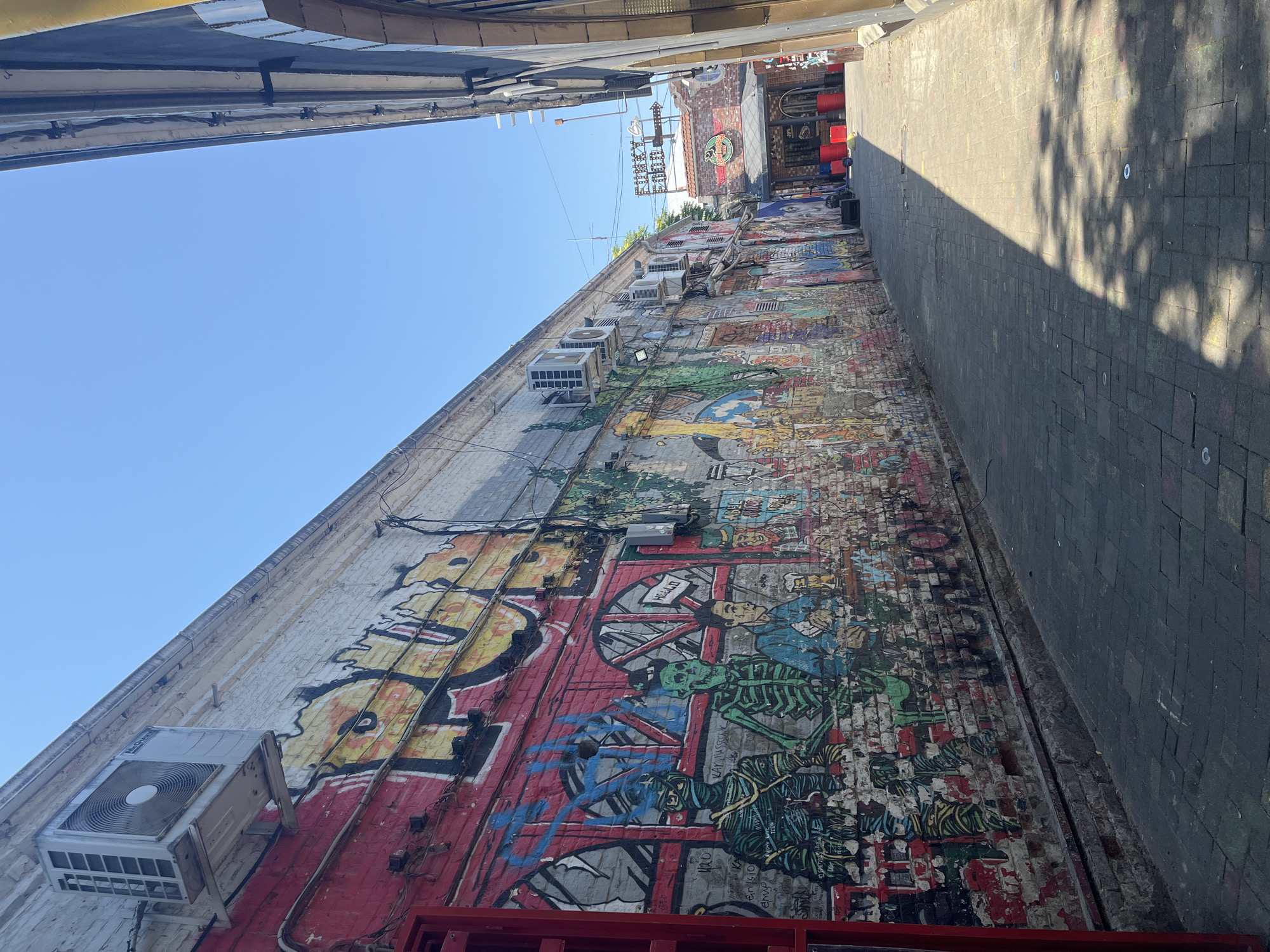 Street-level morning in central Krasnodar, shops, landmarks, and local life