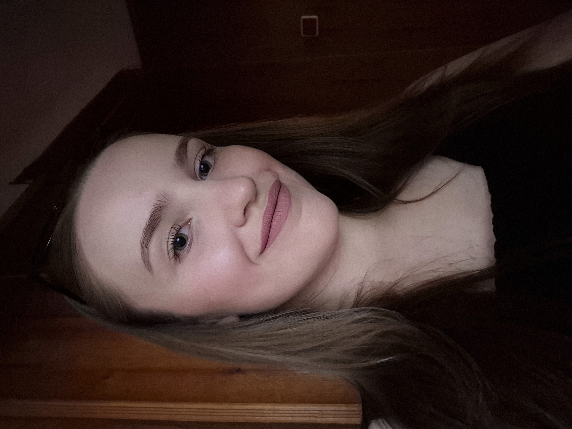 Woman documents evening with selfies and sunset photography