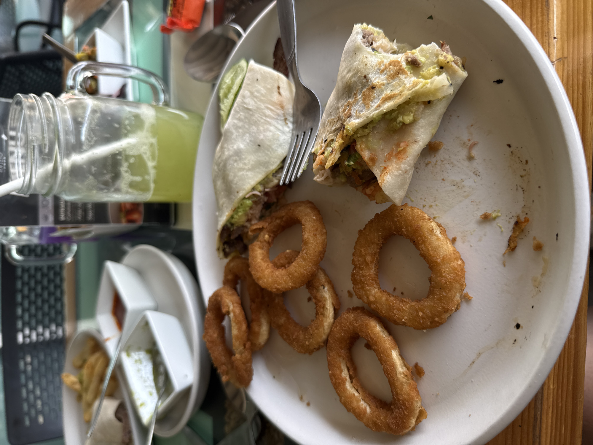 Dinner documented in Puebla featuring tortilla wraps and onion rings