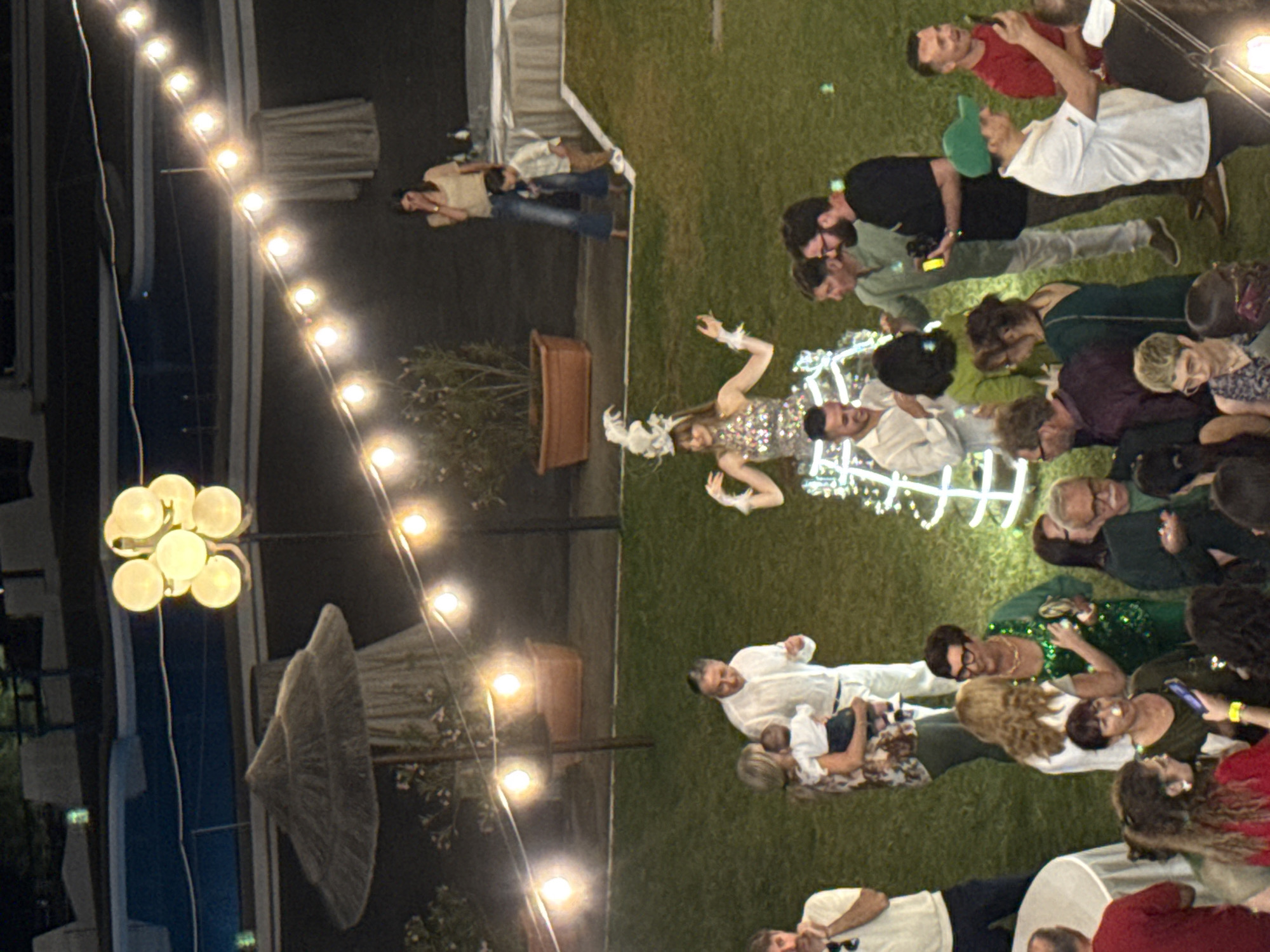 Evening wedding reception held outdoors in Isola delle Femmine