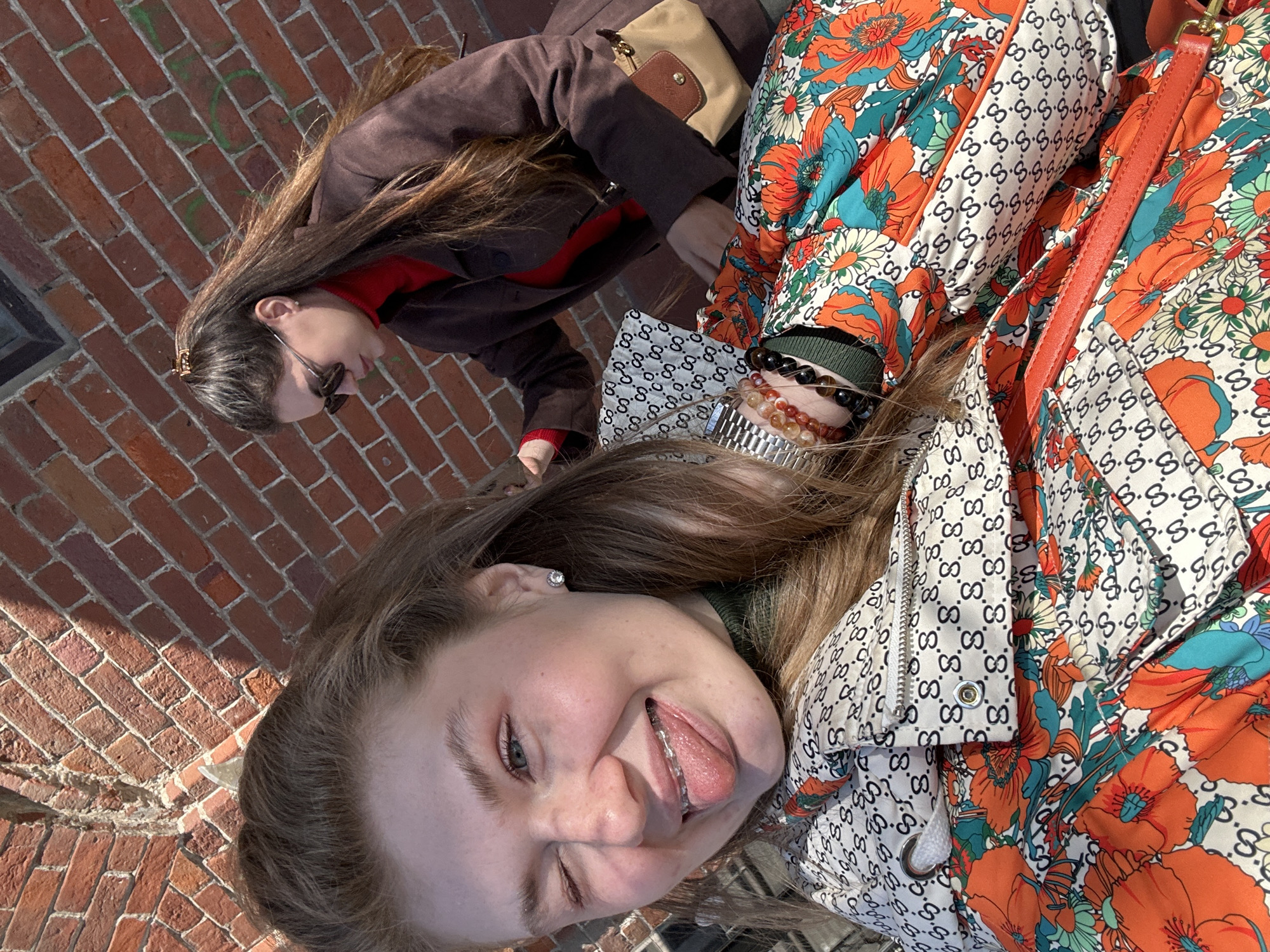 Women photograph themselves exploring Kazan on spring morning