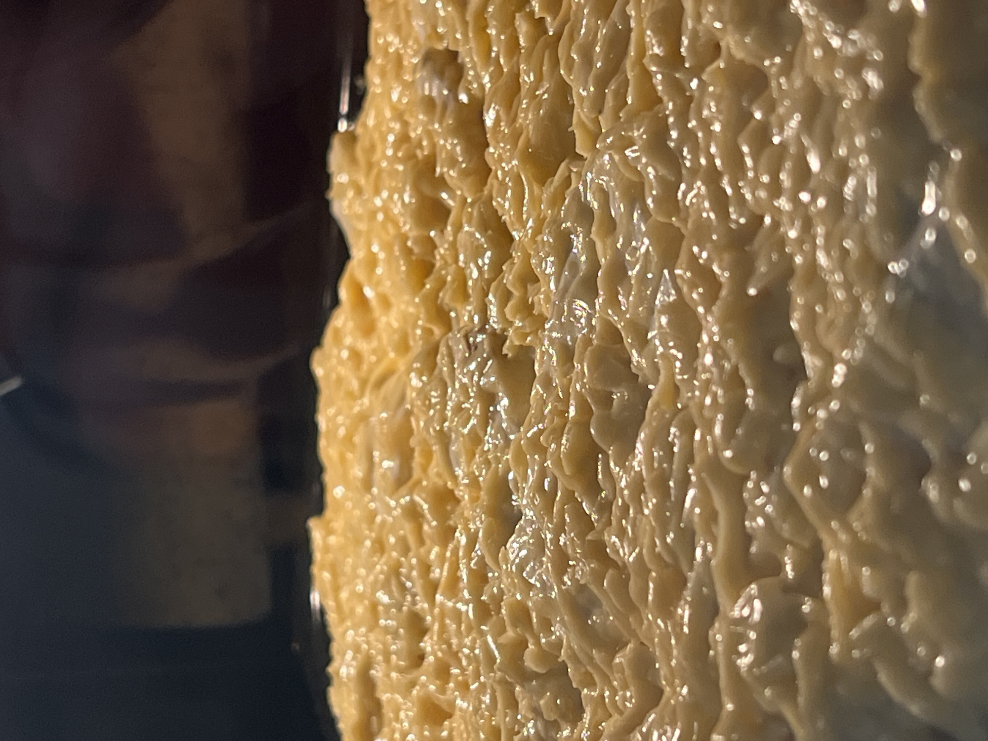 Yellow-frosted dessert documented in close-up food photography