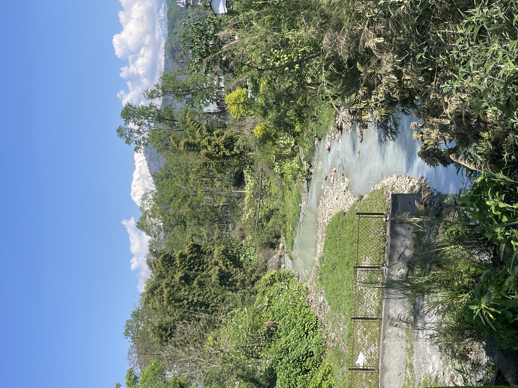 Milky river waters documented near Pokhara, Nepal tributary