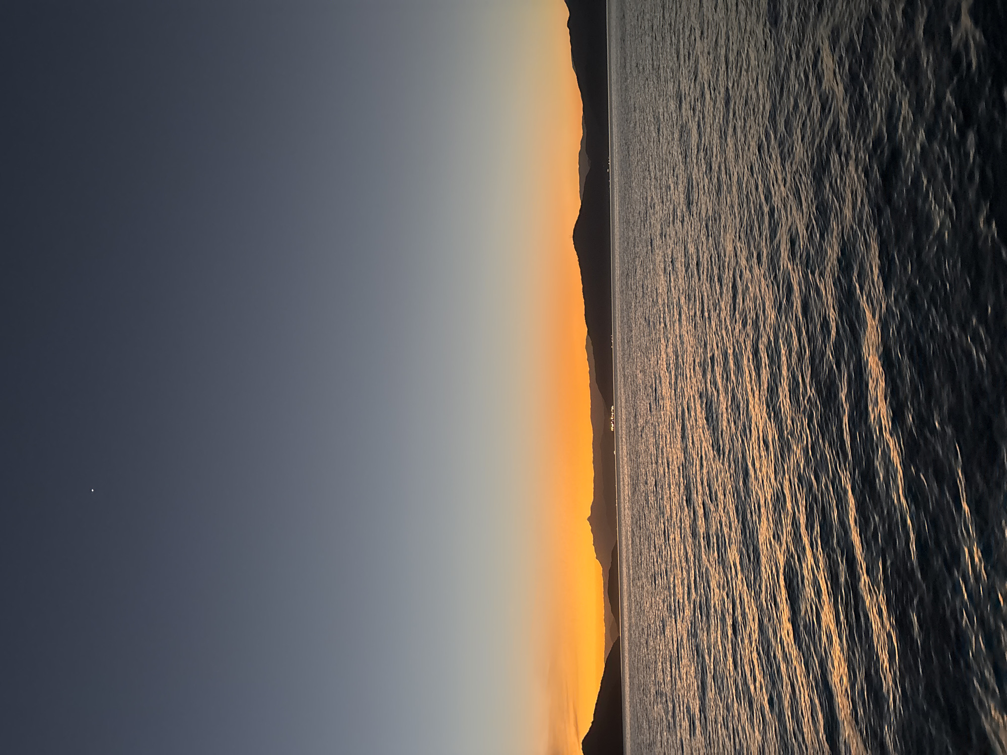 Sunset over Angra dos Reis bay, viewed from a ferry