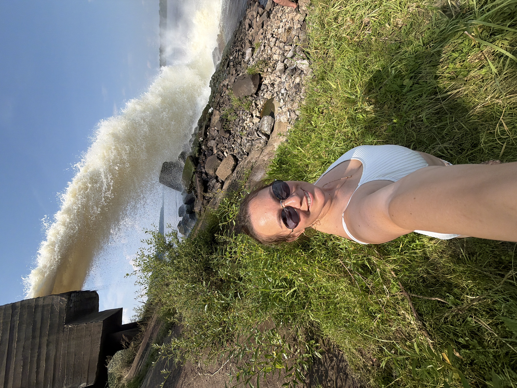 Selfies at a roaring water release structure in Chernushka