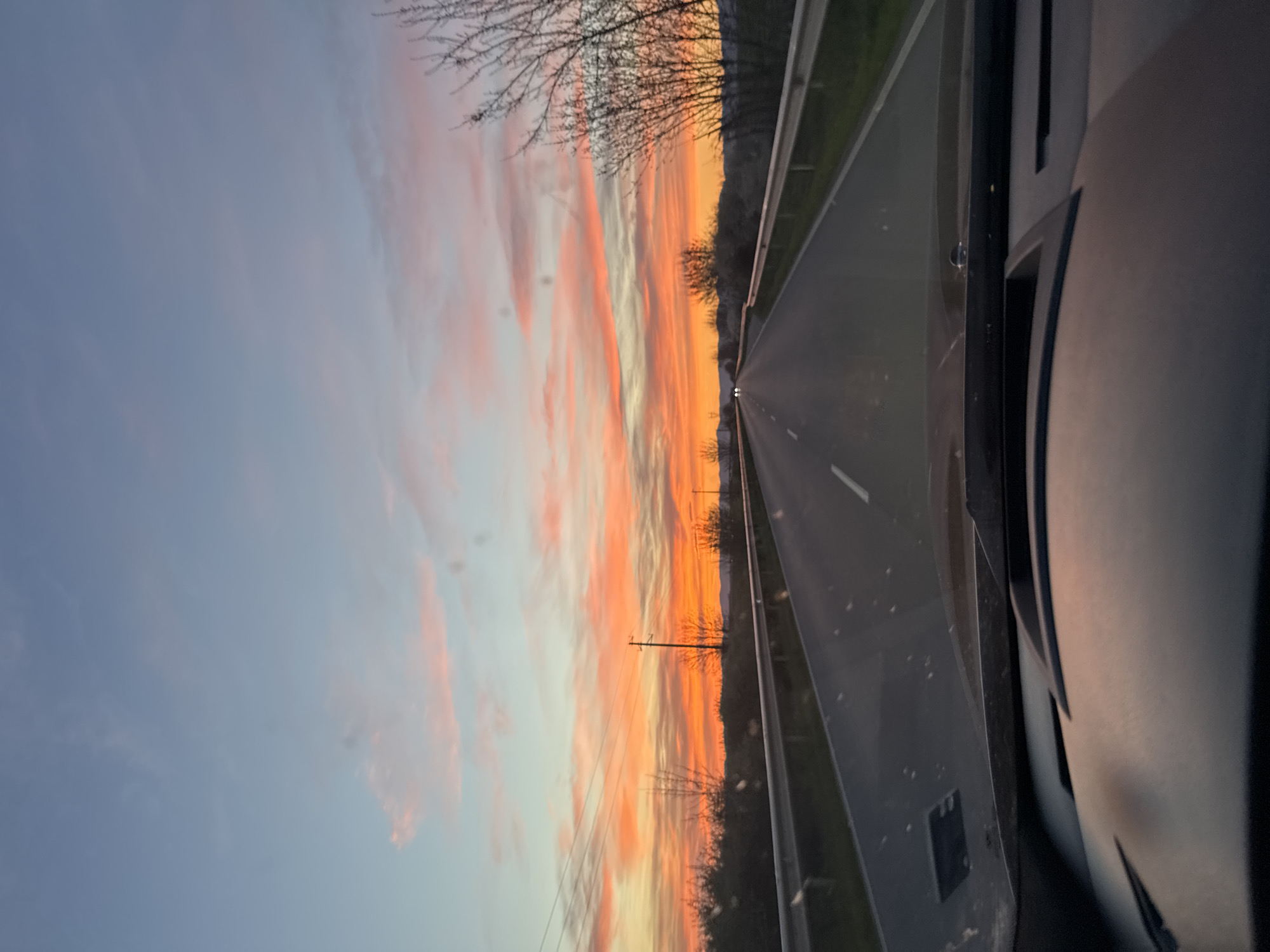 Sunset observed from vehicle on road near Sarnevo, Bulgaria