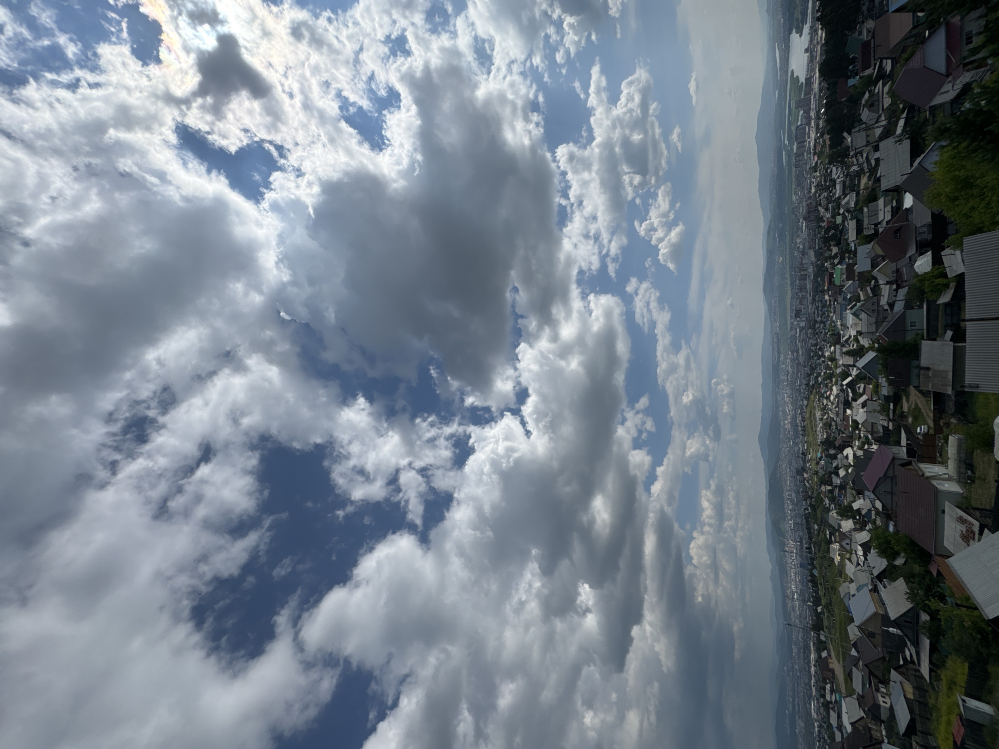 Ulan-Ude's hillside suburbs seen from above and ground level