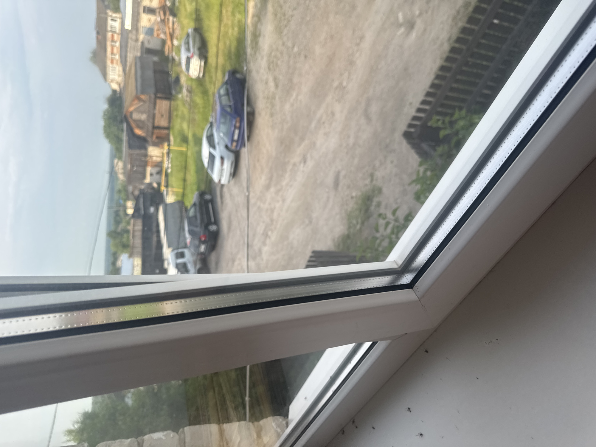 Window views of rural Russian village life in Krasnye Baki