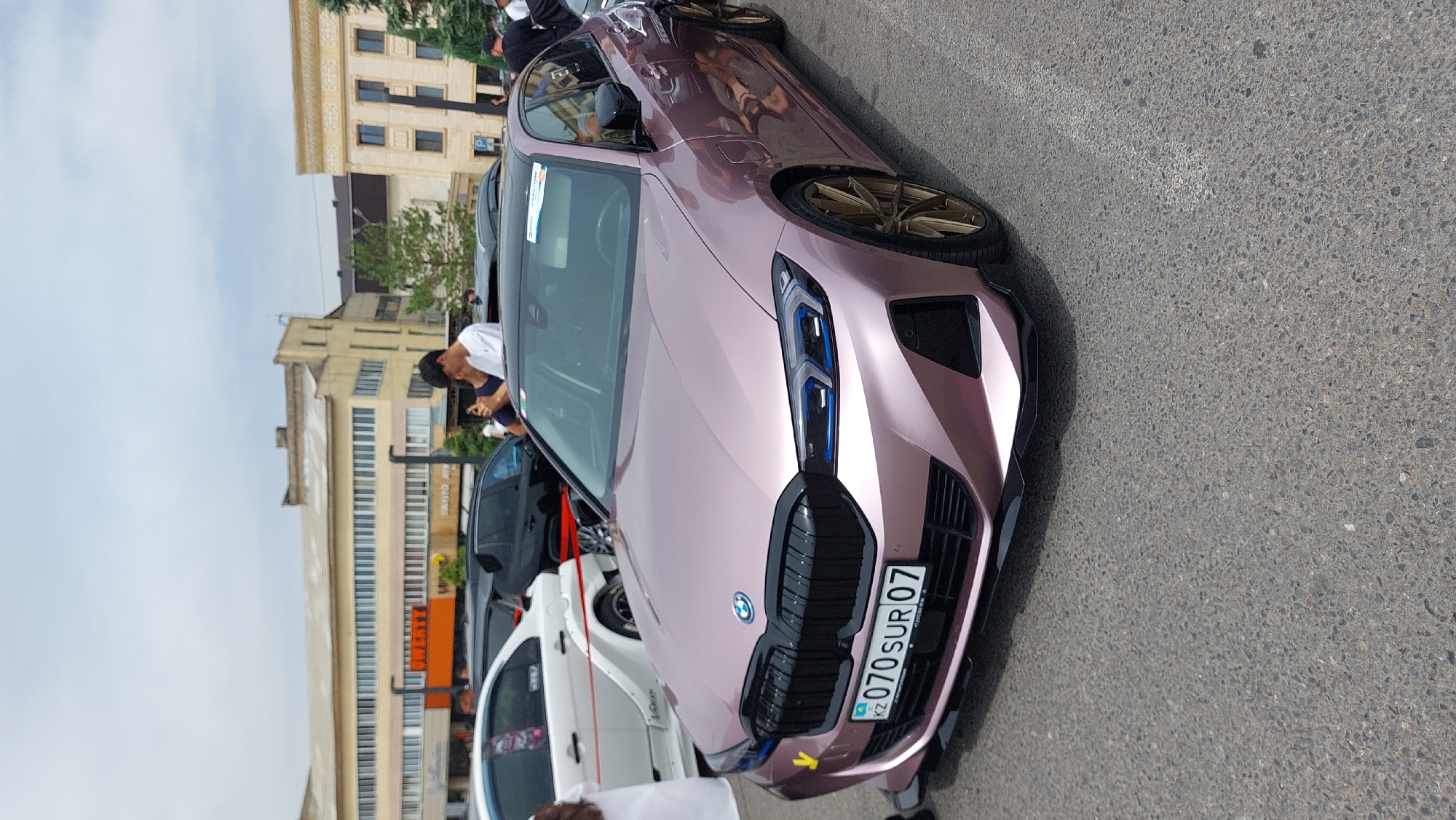 Car show features vintage and modified vehicles in Taraz