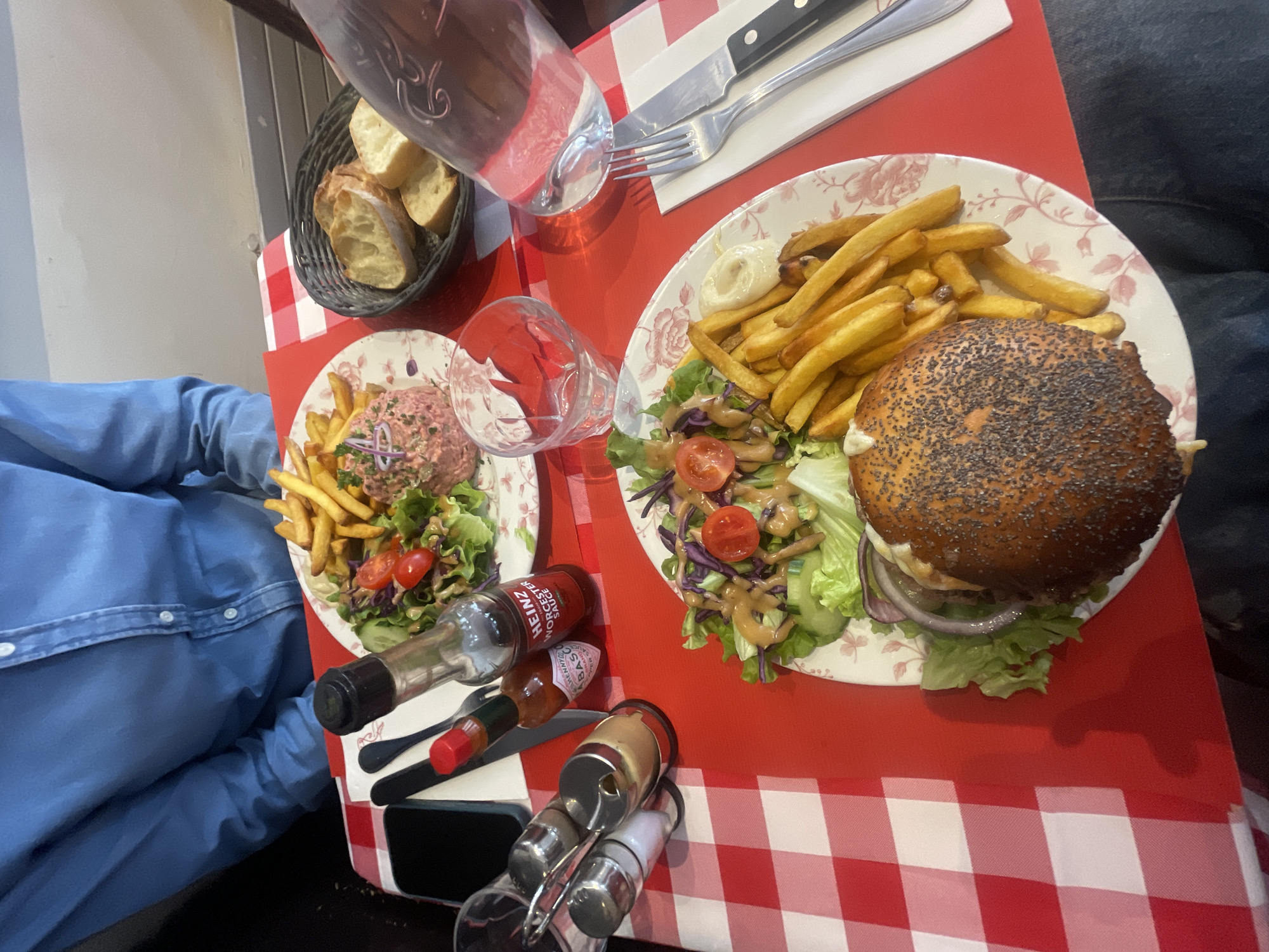 Parisian restaurant meal documented with sundaes and checkered tablecloth