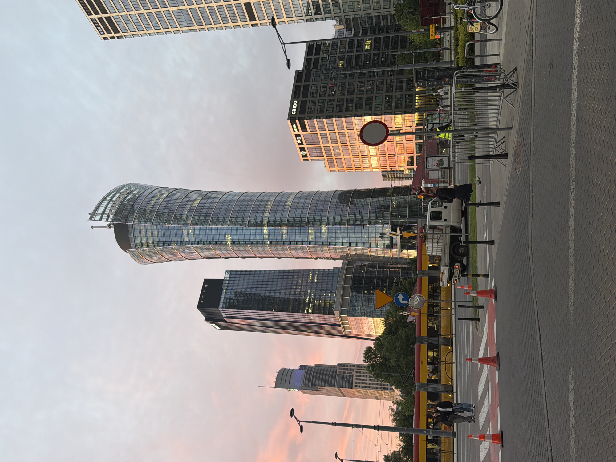 City dwellers capture golden hour scenes, selfies across urban landscape