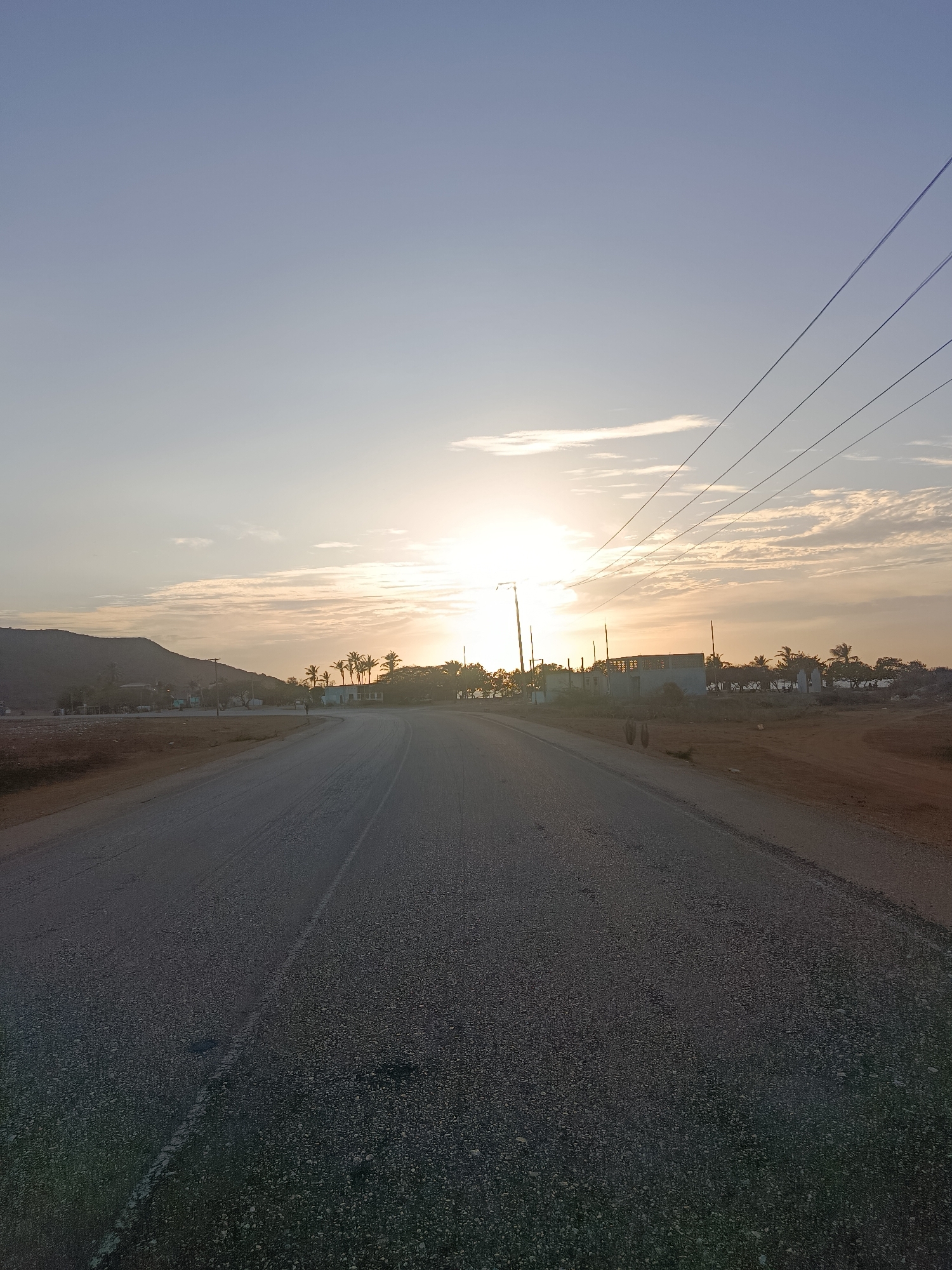 Sunset documented along coastal road in Altagracia, Venezuela