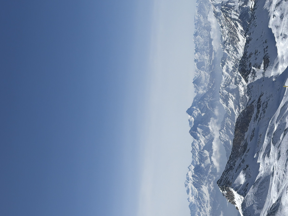 Skier photographed on Valtournenche slopes under clear skies