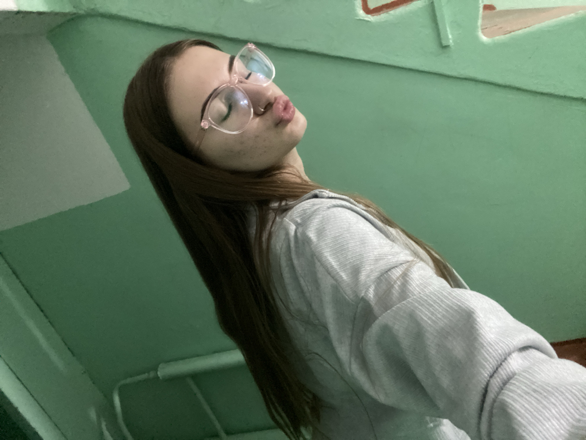 Young woman documents evening outing with selfies, nighttime scenes