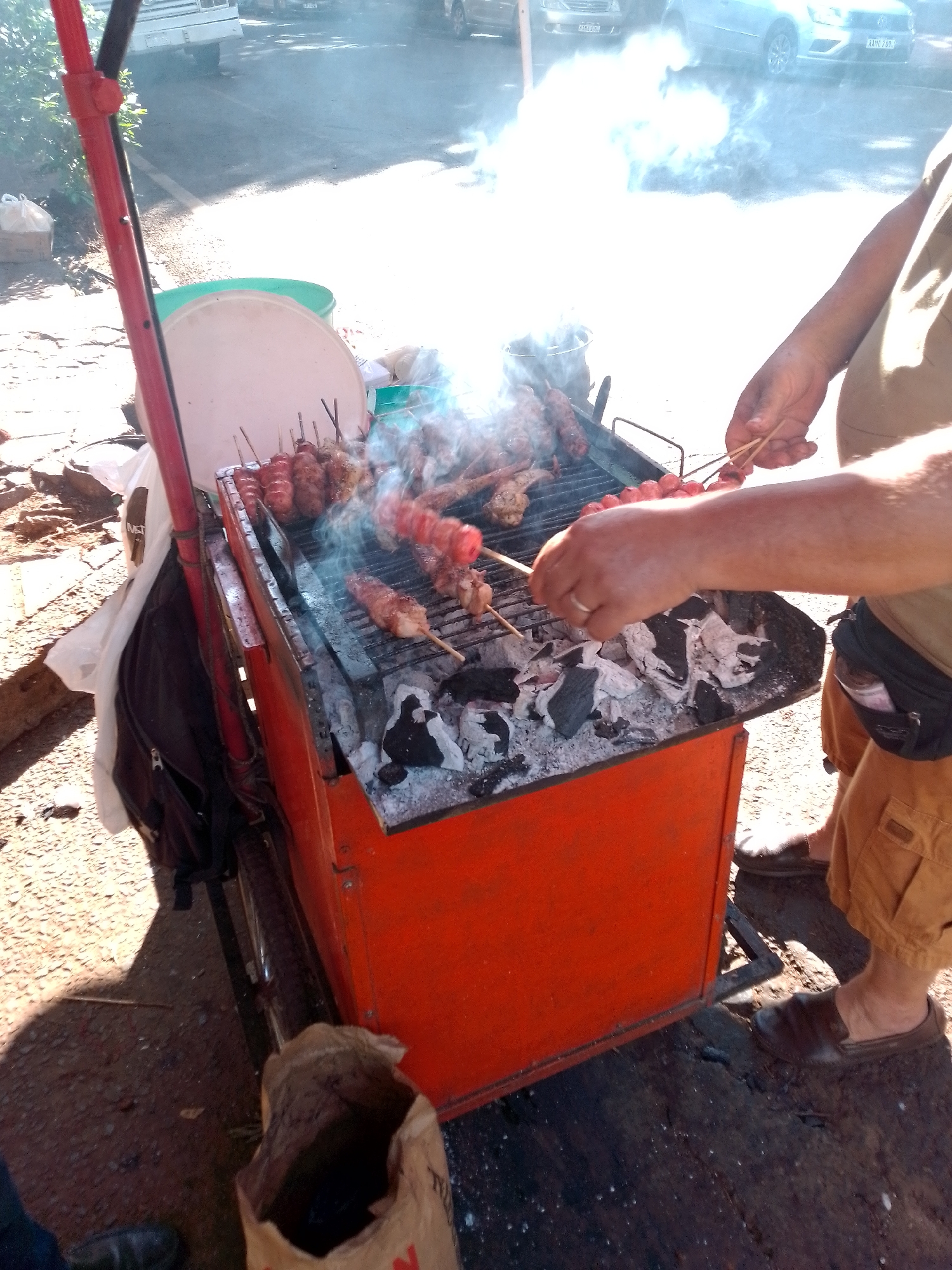 Street vendor and car dealership scenes documented in Ciudad del Este