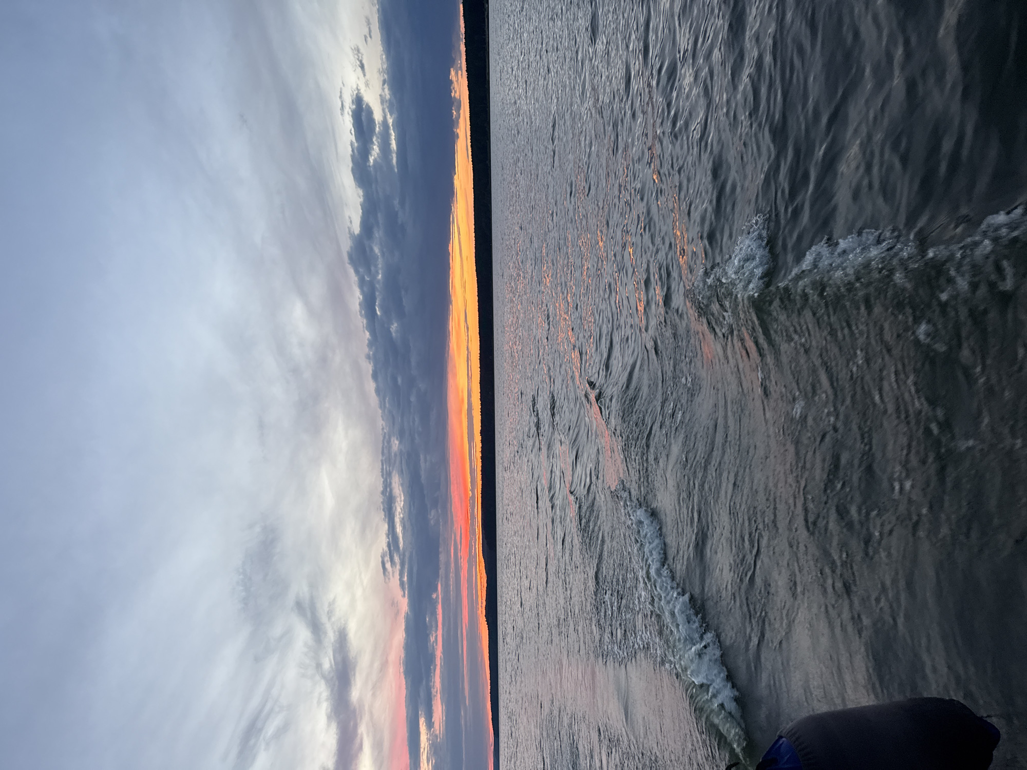 Evening boat ride on the water near Votkinsk at sunset