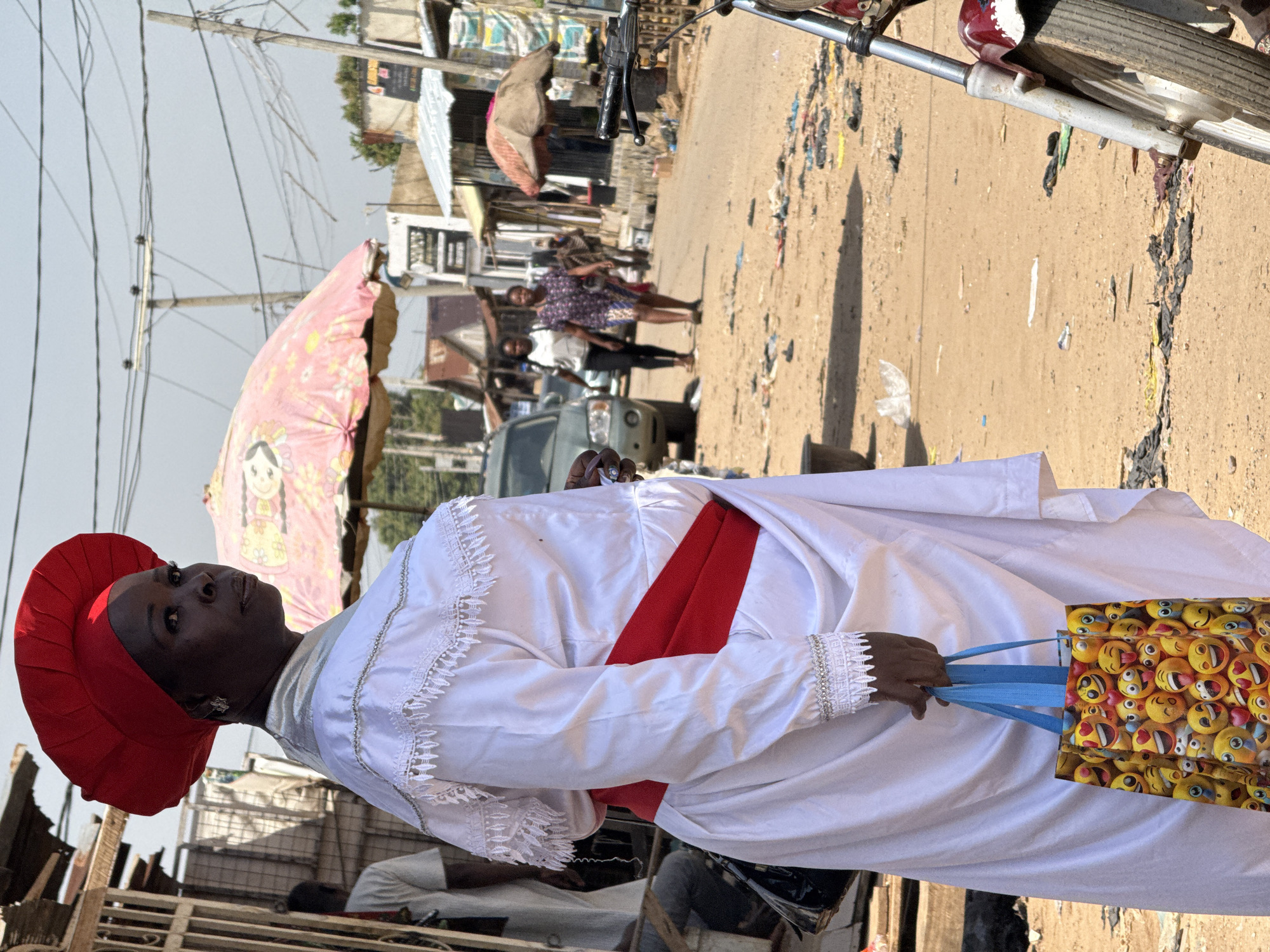 Morning foot traffic and street life in an Abuja market