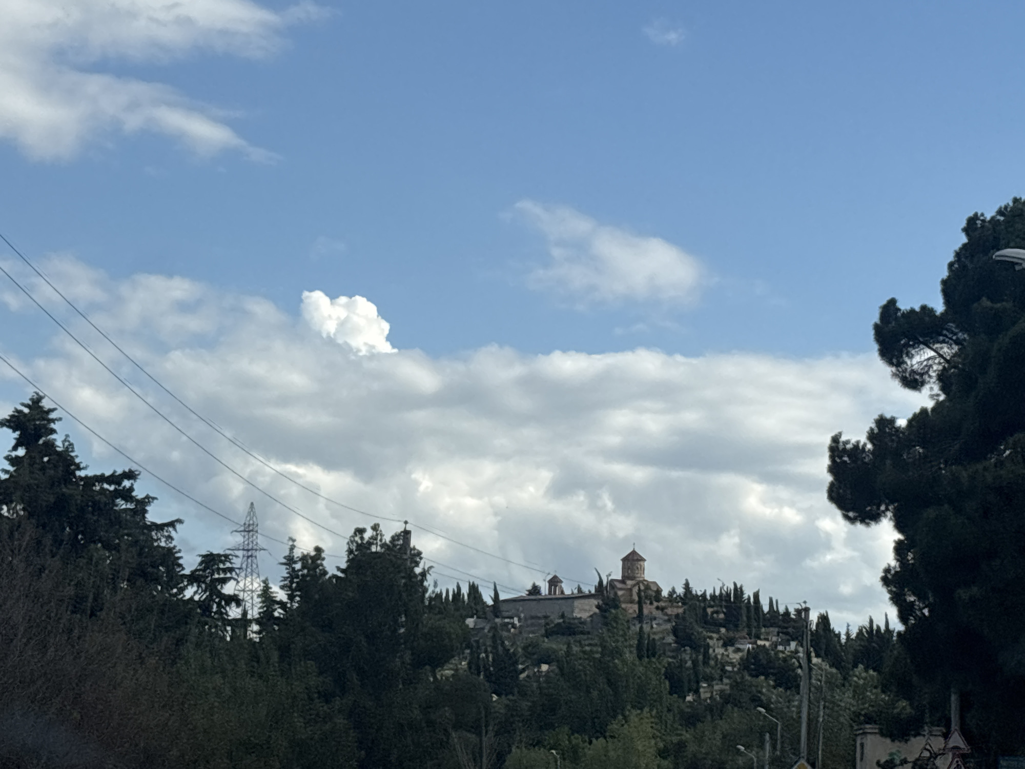 Street scenes and hilltop landmarks across Tbilisi