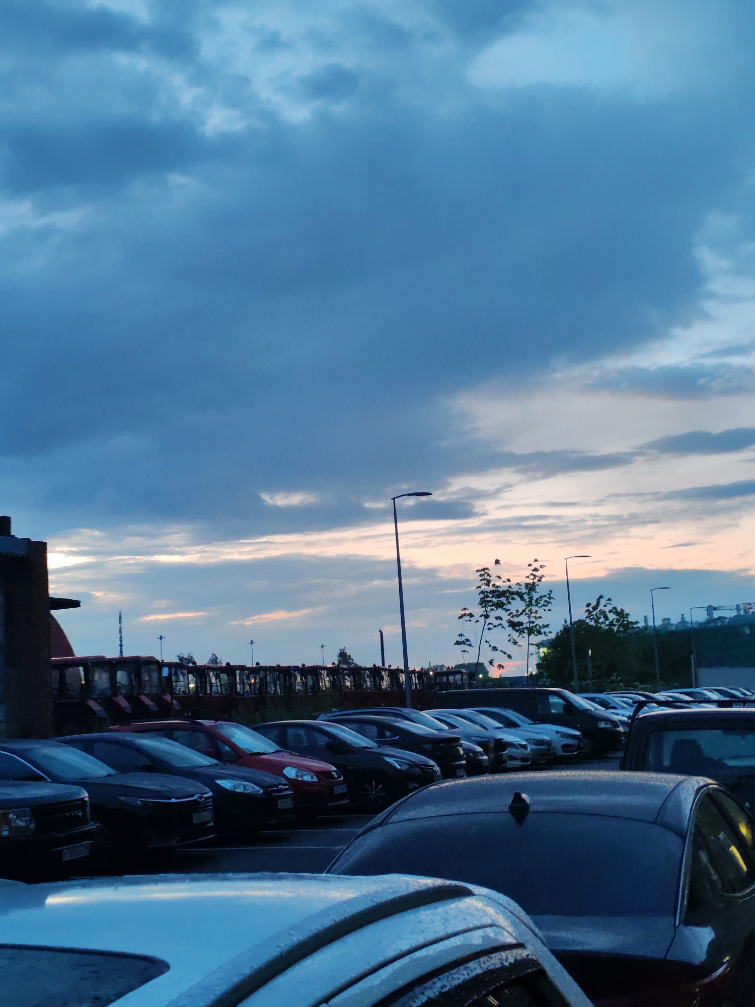 Summer evening around a Shushary apartment complex and nearby streets