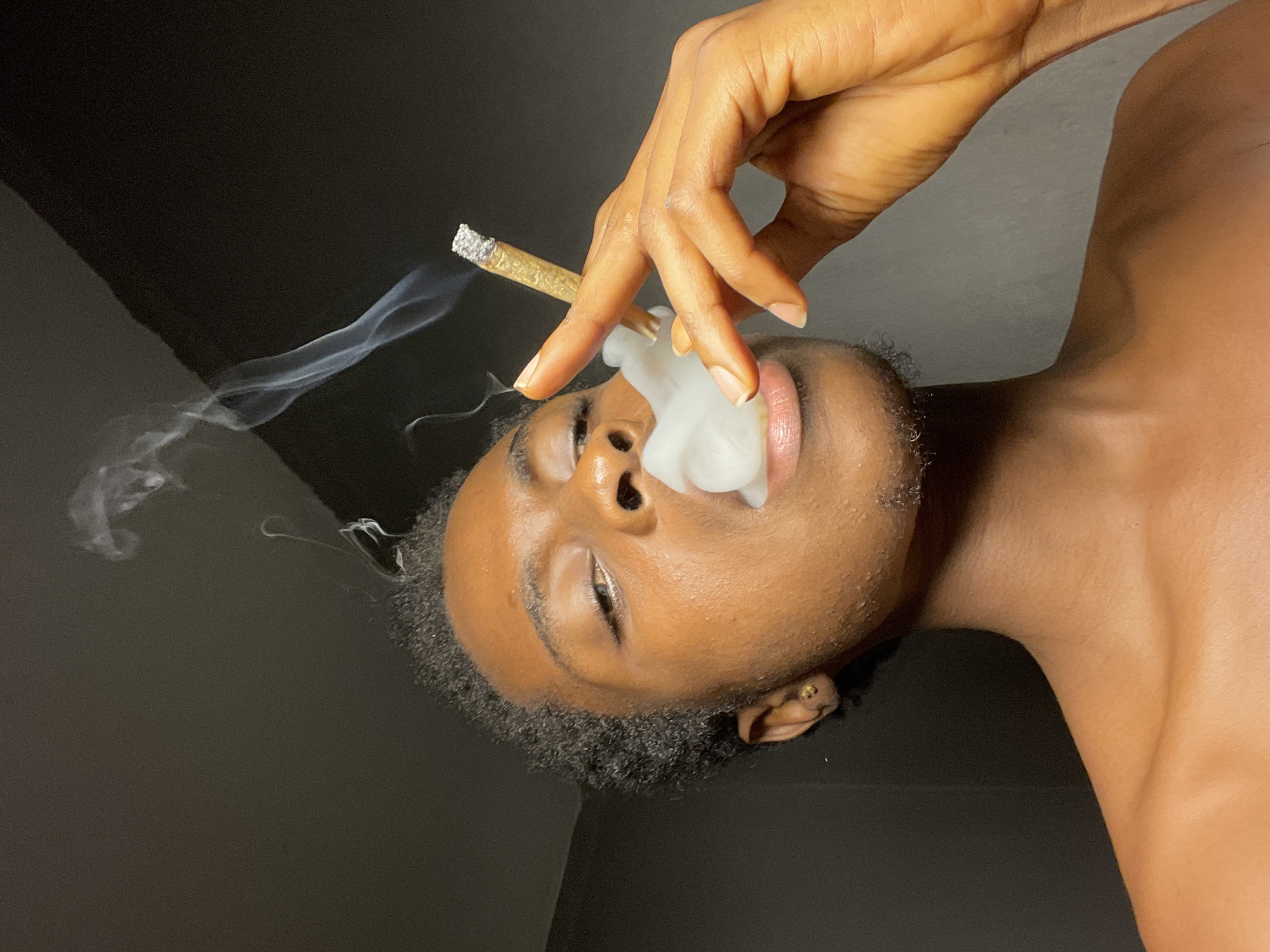 Person smoking indoors captured in multiple witness accounts Nigeria
