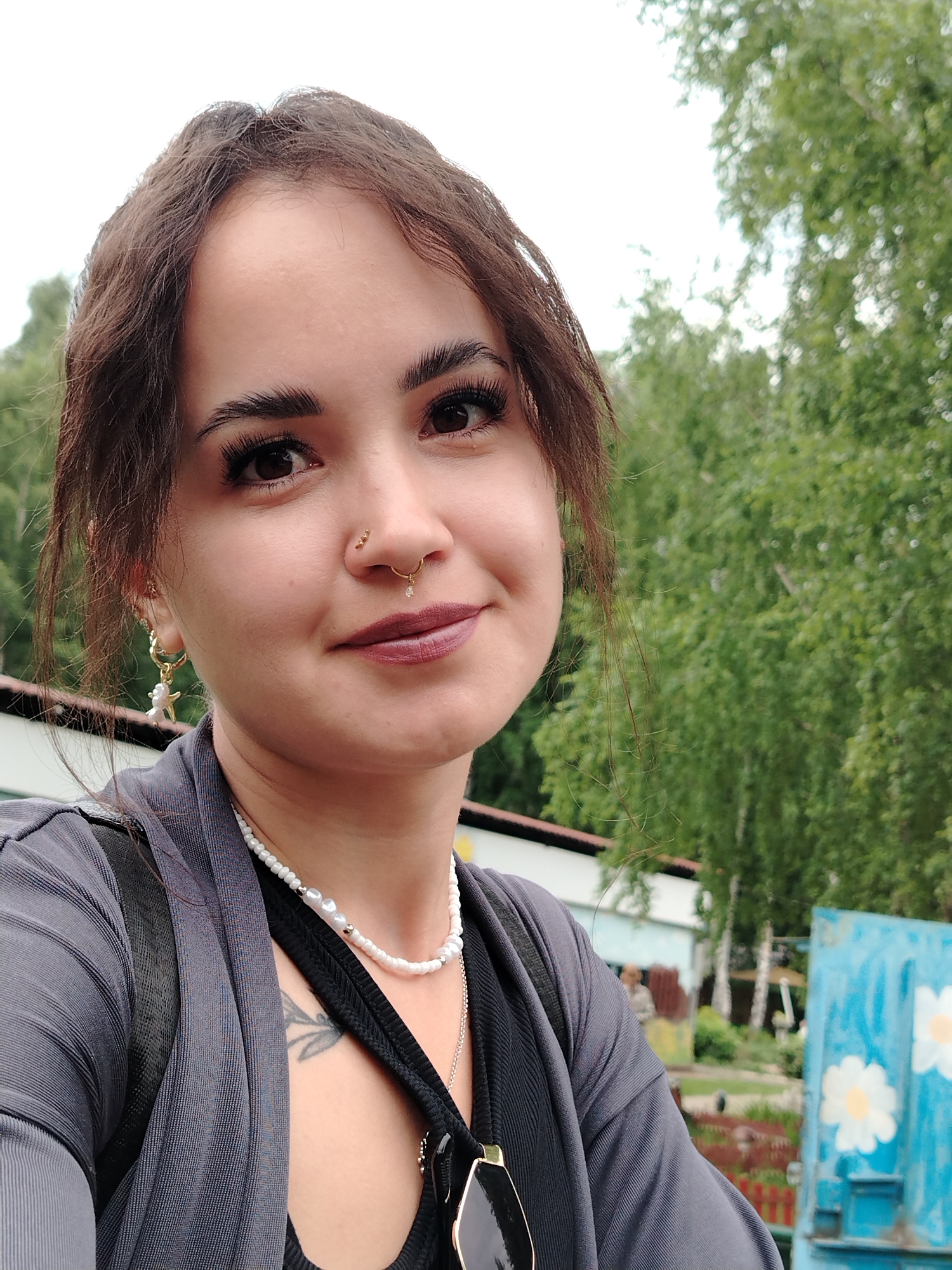 Families enjoy afternoon at Chaikovsky amusement park near Kama River