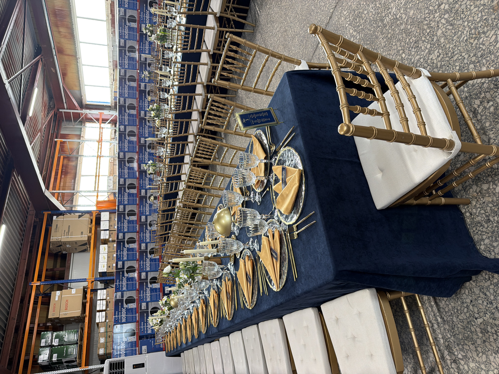 Formal event setup observed at Gabrovo warehouse venue