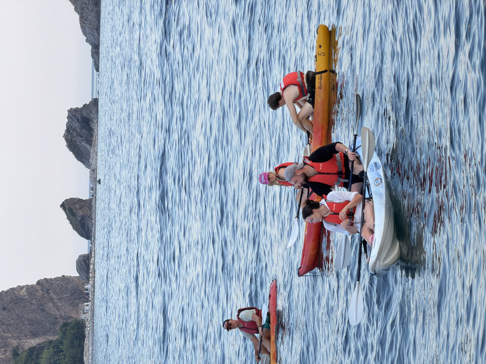 Kayaks, parasails, and boats fill Budva's Adriatic waterfront