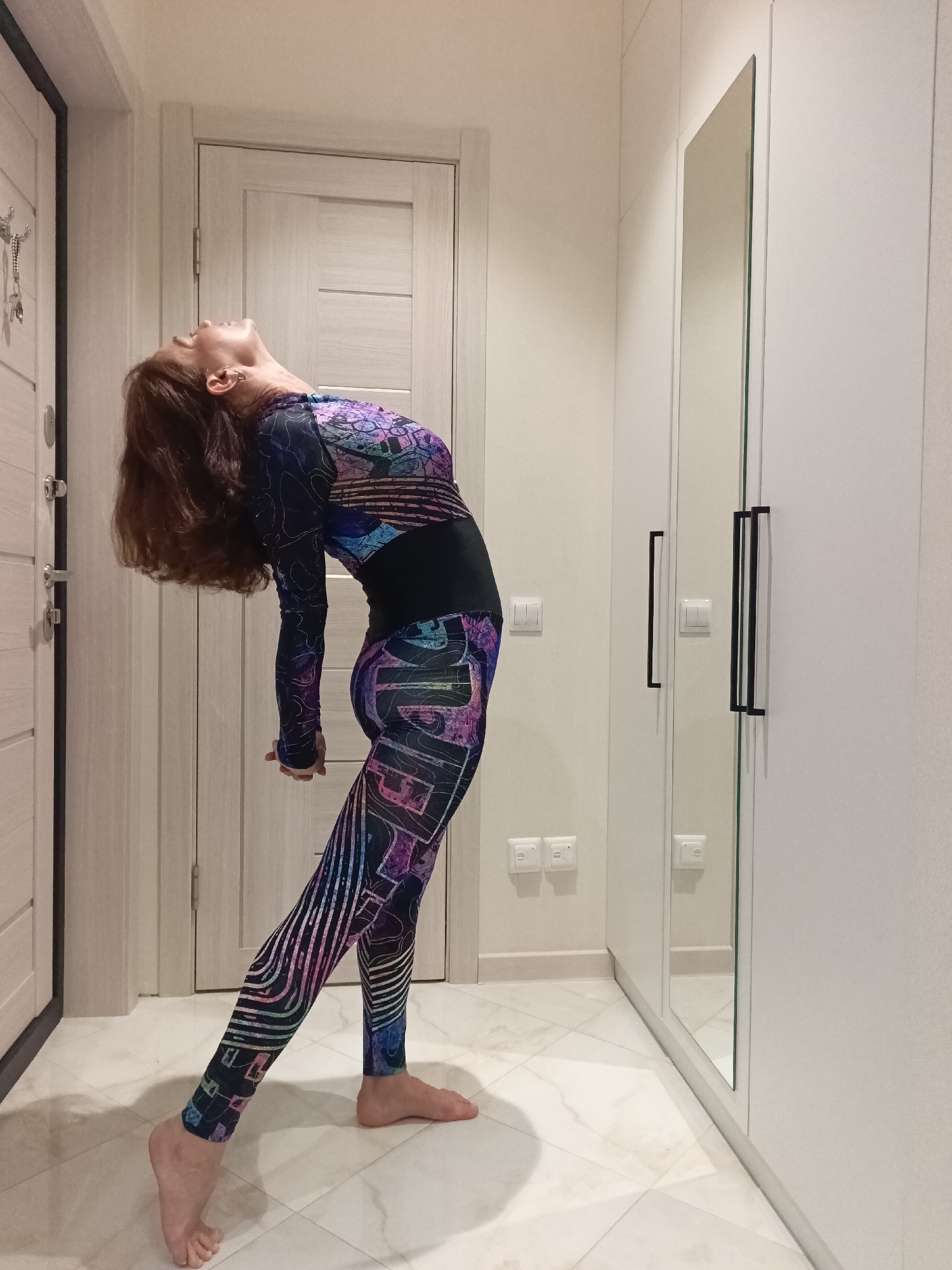 Yoga and acrobatics in a Sochi hallway turned home studio