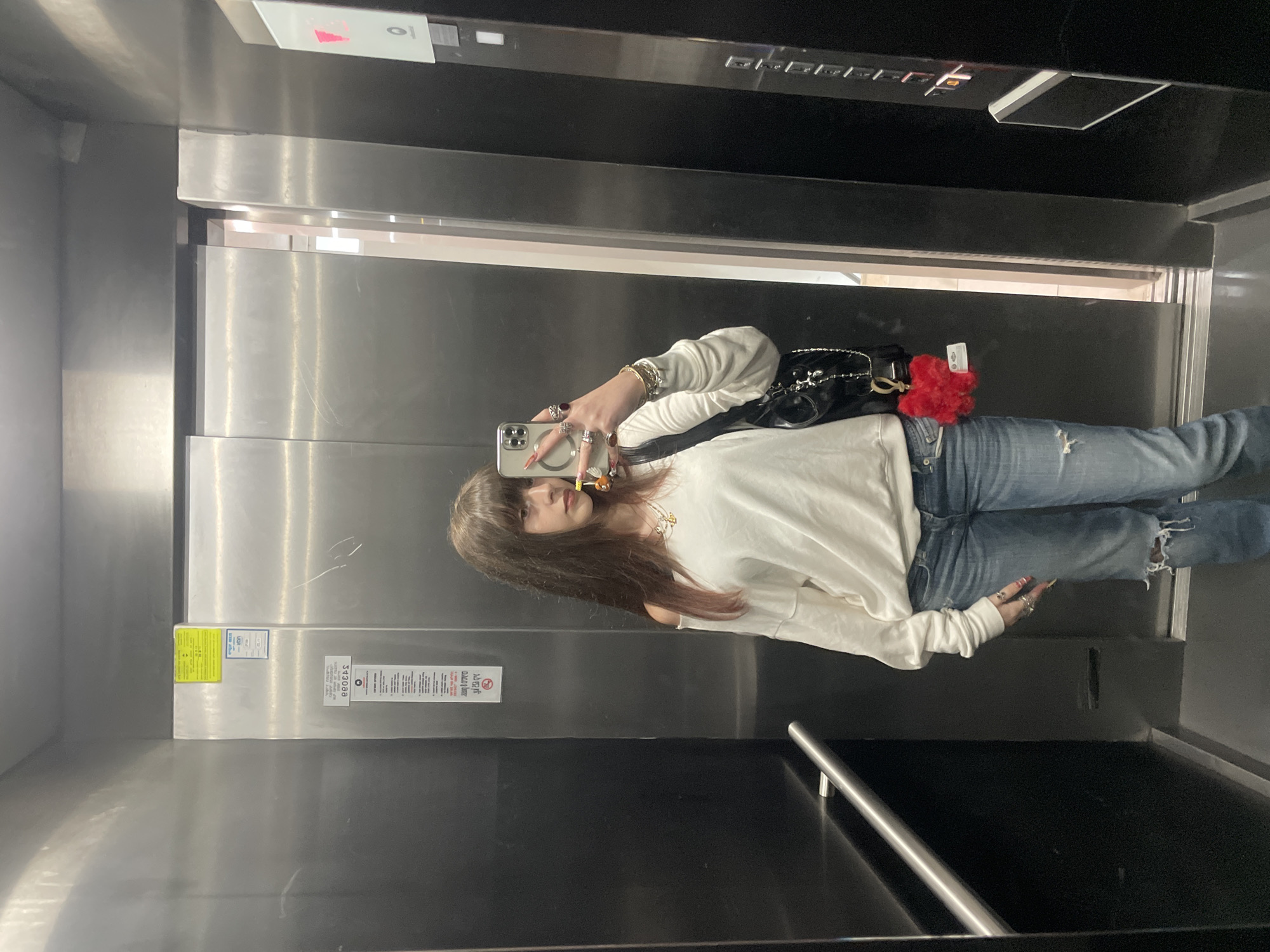 Person takes elevator selfies in Raanana, Israel